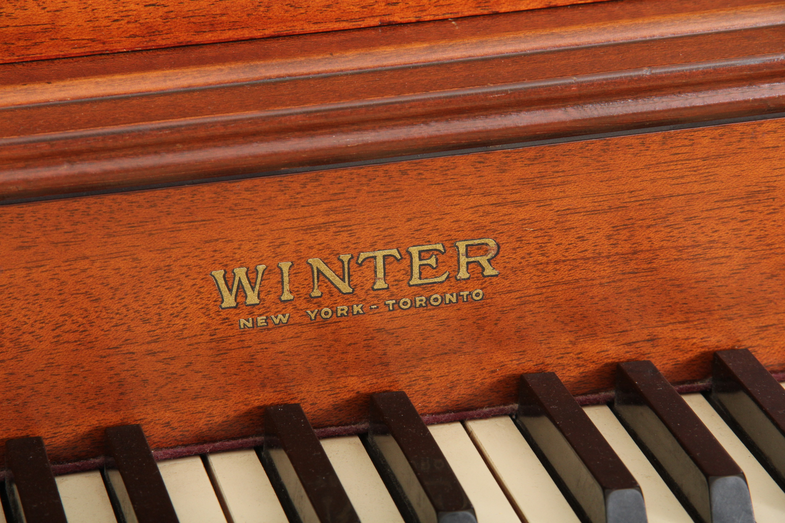 Winter and Co. Upright Piano