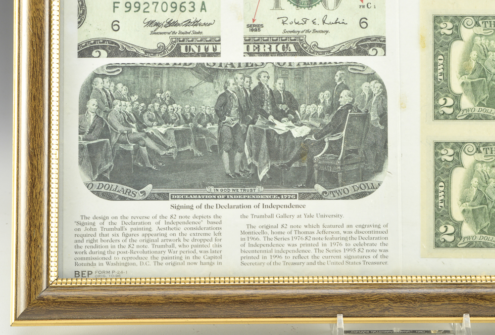 A Framed Uncut Two Dollar Bill Sheet