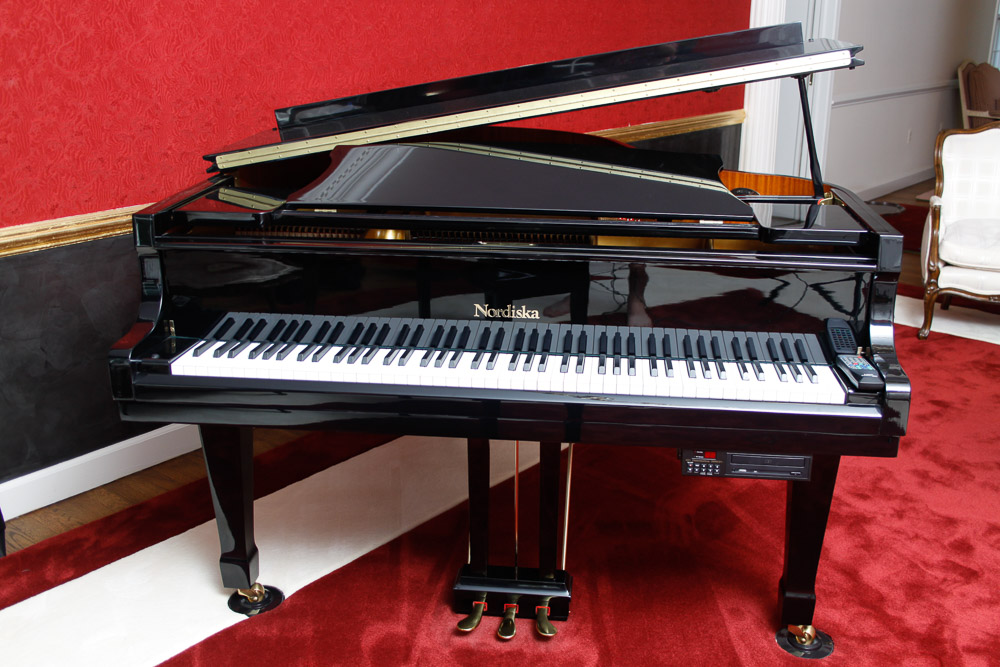 Nordiska Baby Grand Piano and Disc Player