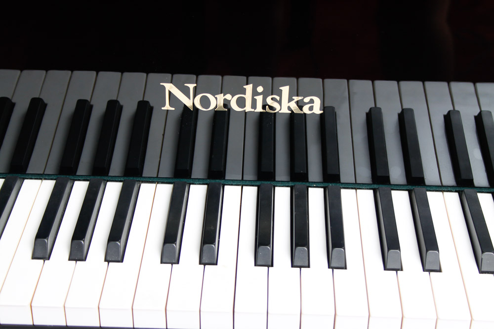 Nordiska Baby Grand Piano and Disc Player