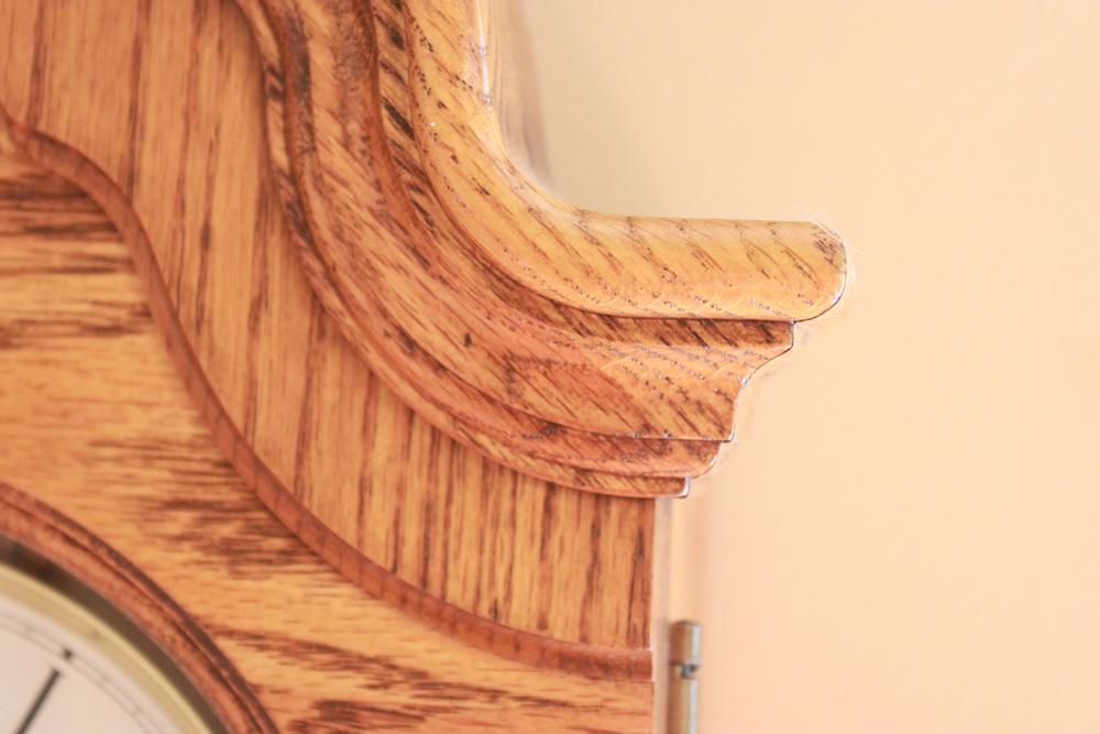 Howard Miller Oak Wall Clock