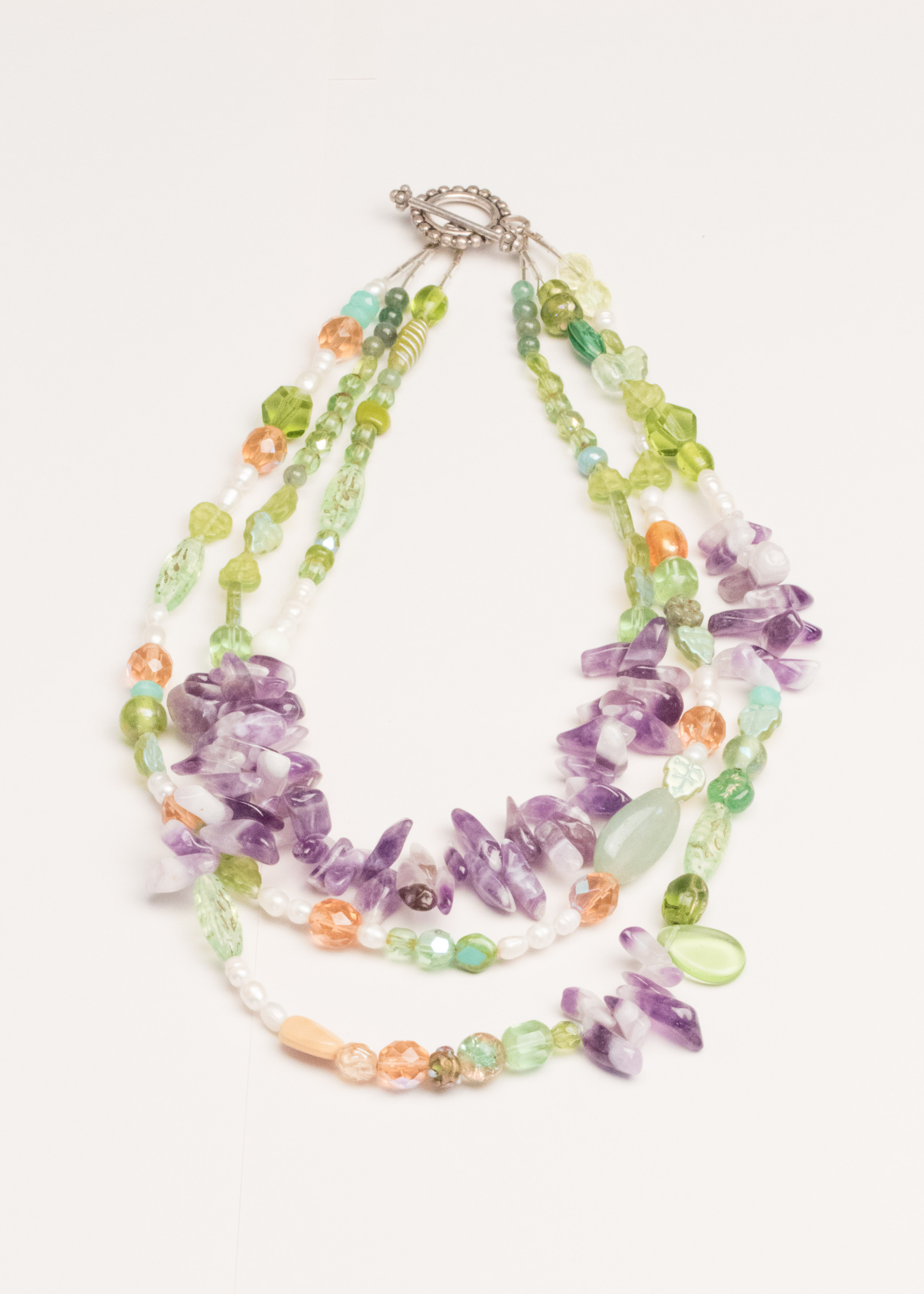 Assortment of Stone and and Gold Tone Costume Jewelry