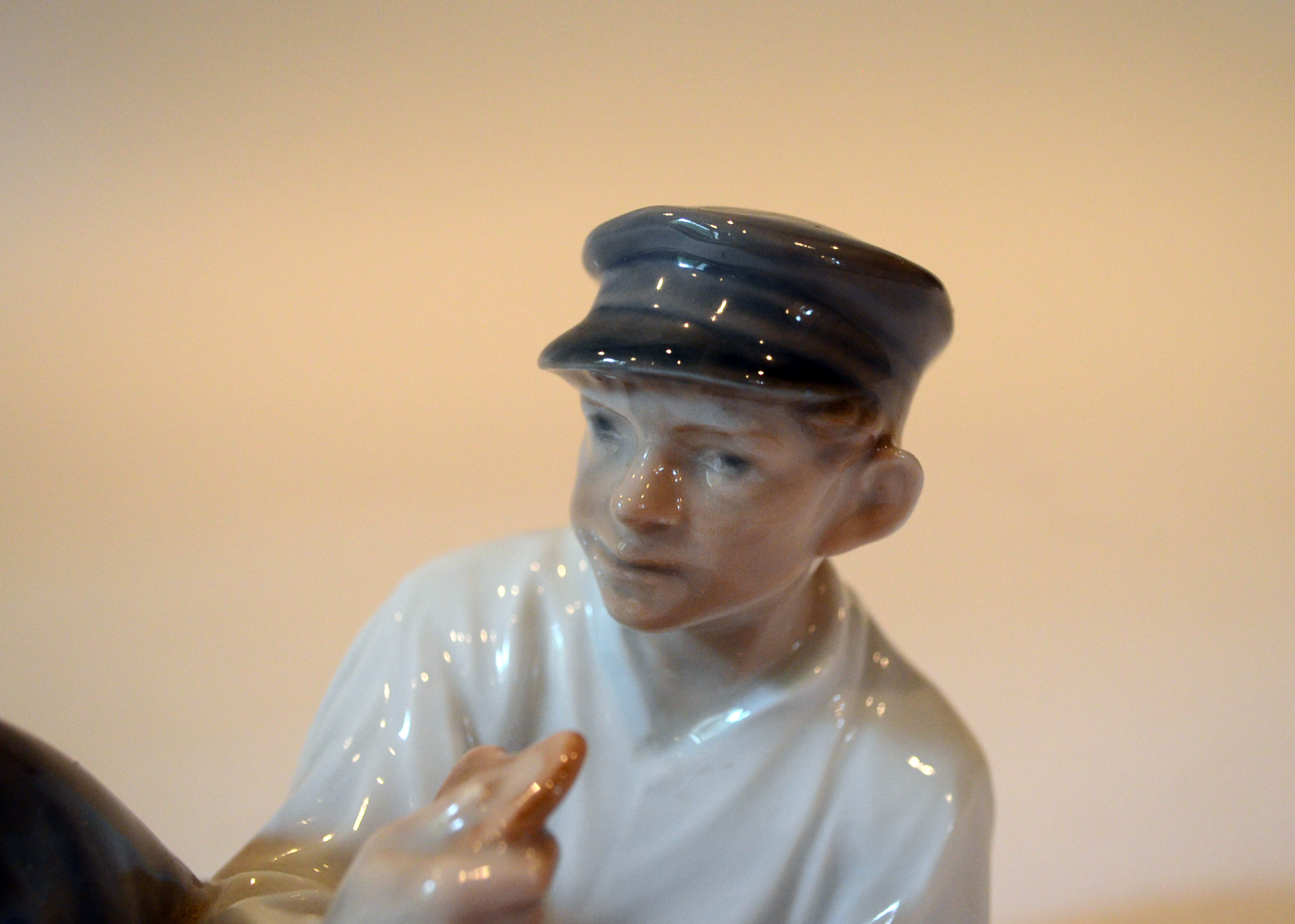 Royal Copenhagen "Boy At Lunch" Figurine