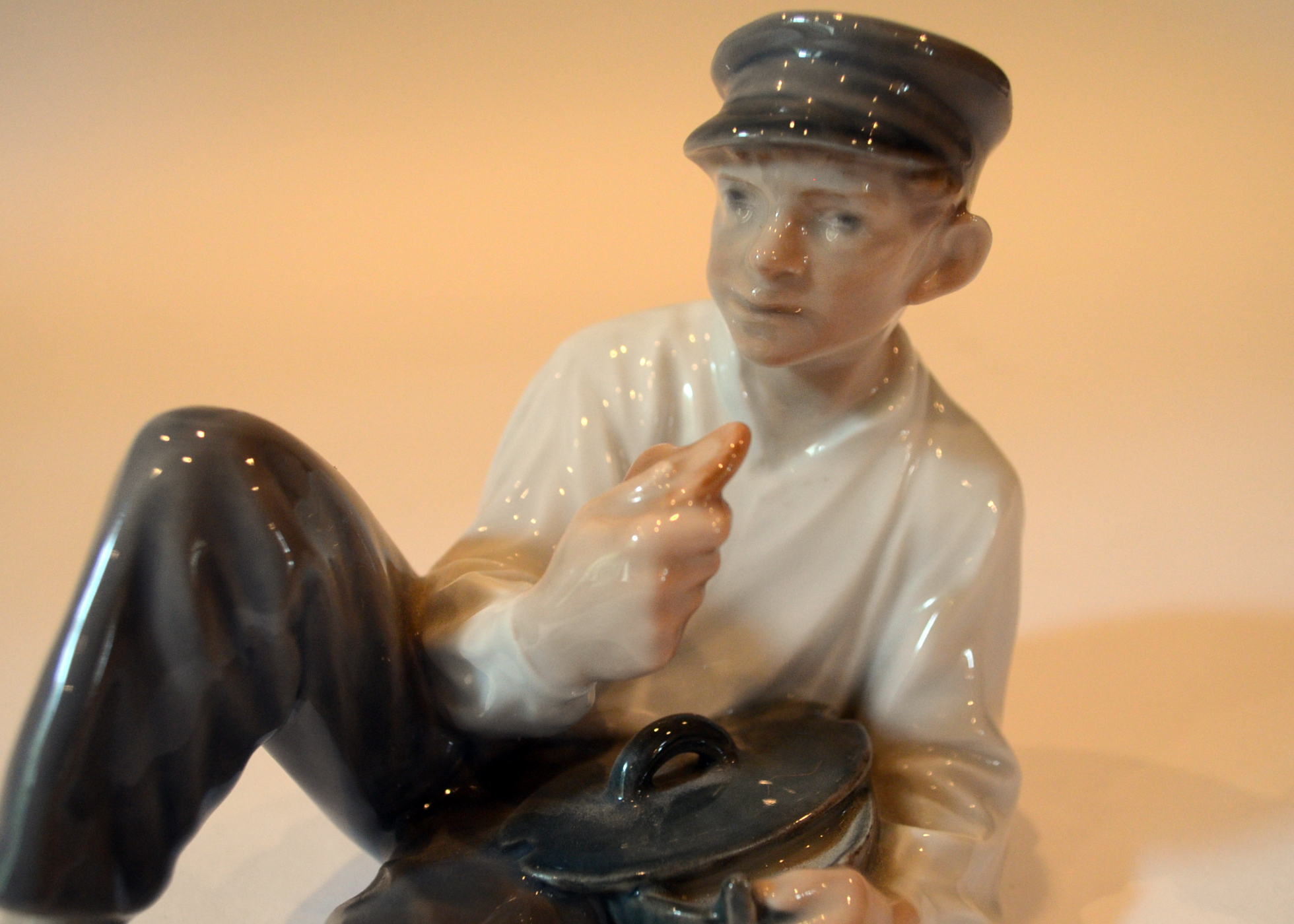 Royal Copenhagen "Boy At Lunch" Figurine