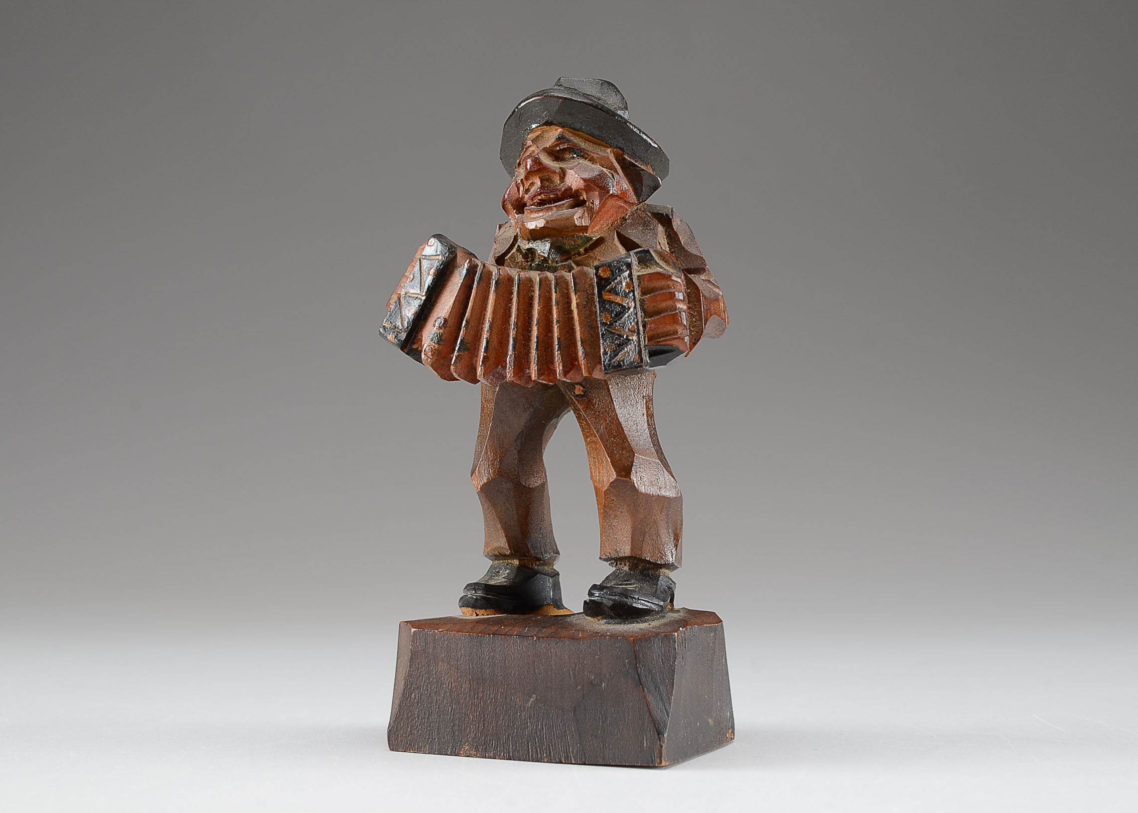 Vintage Carved Wood Accordion Player Figurine
