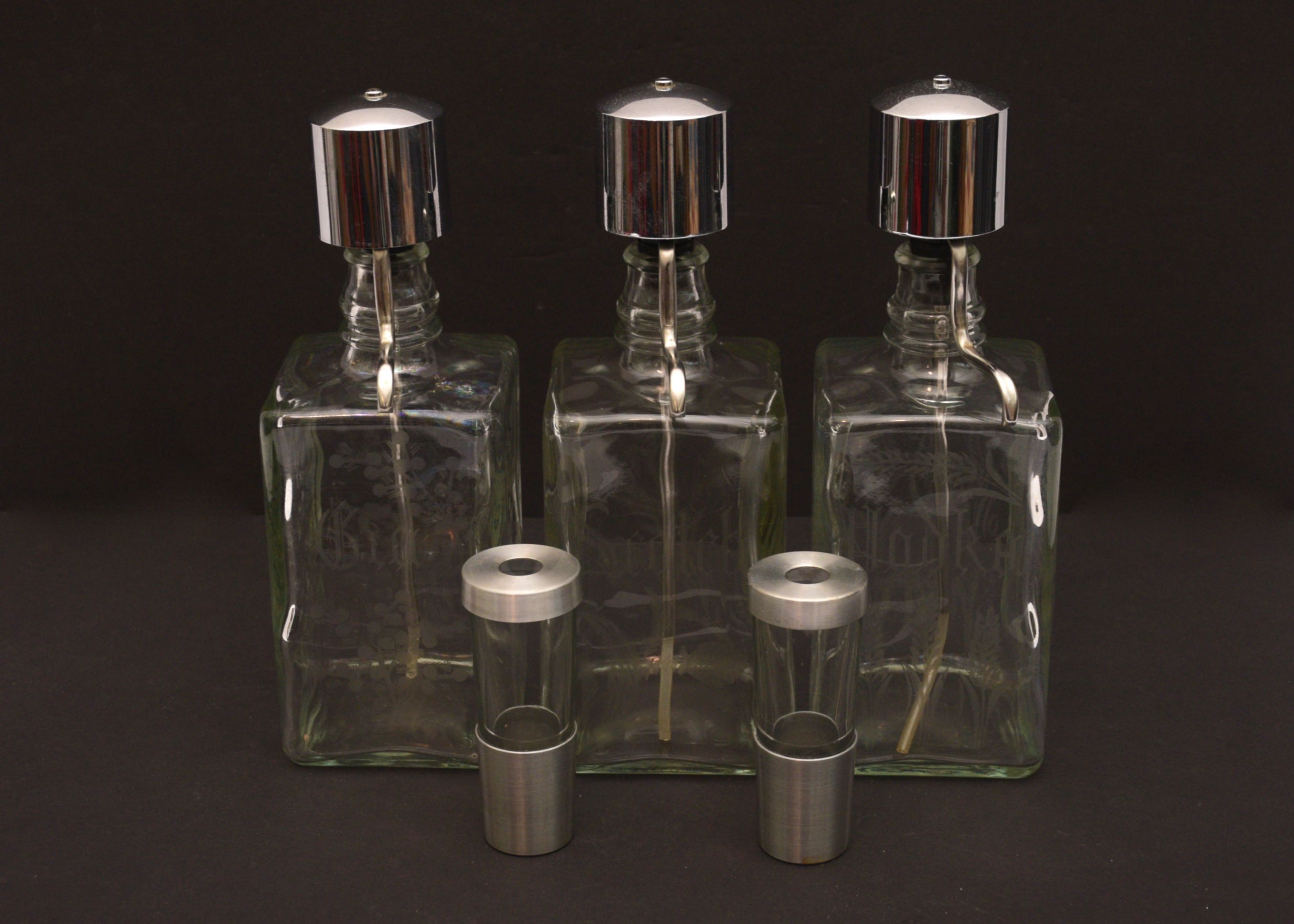 Trio of Liquor Decanters with Pump Dispensers plus Jiggers