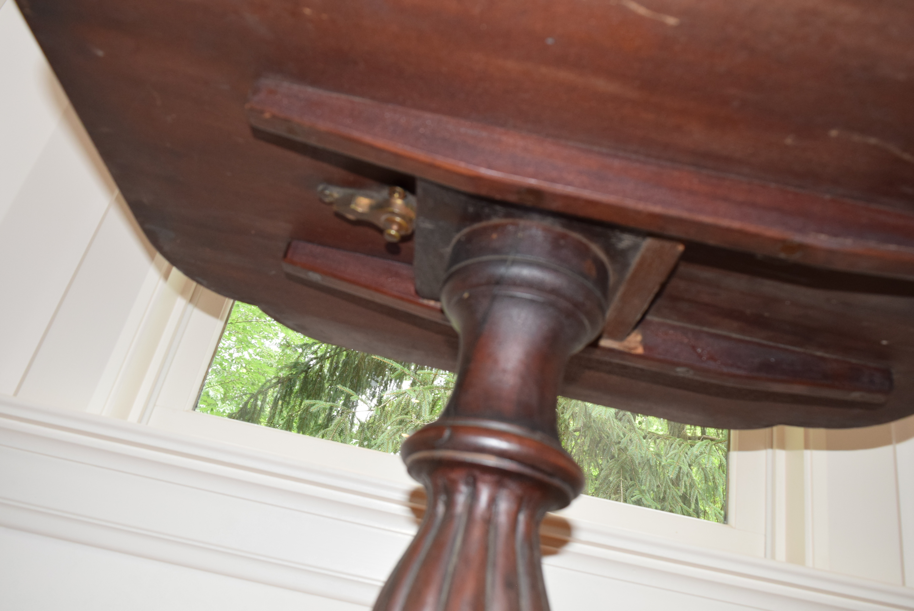 Three Legged Pedestal Tilt Top Table