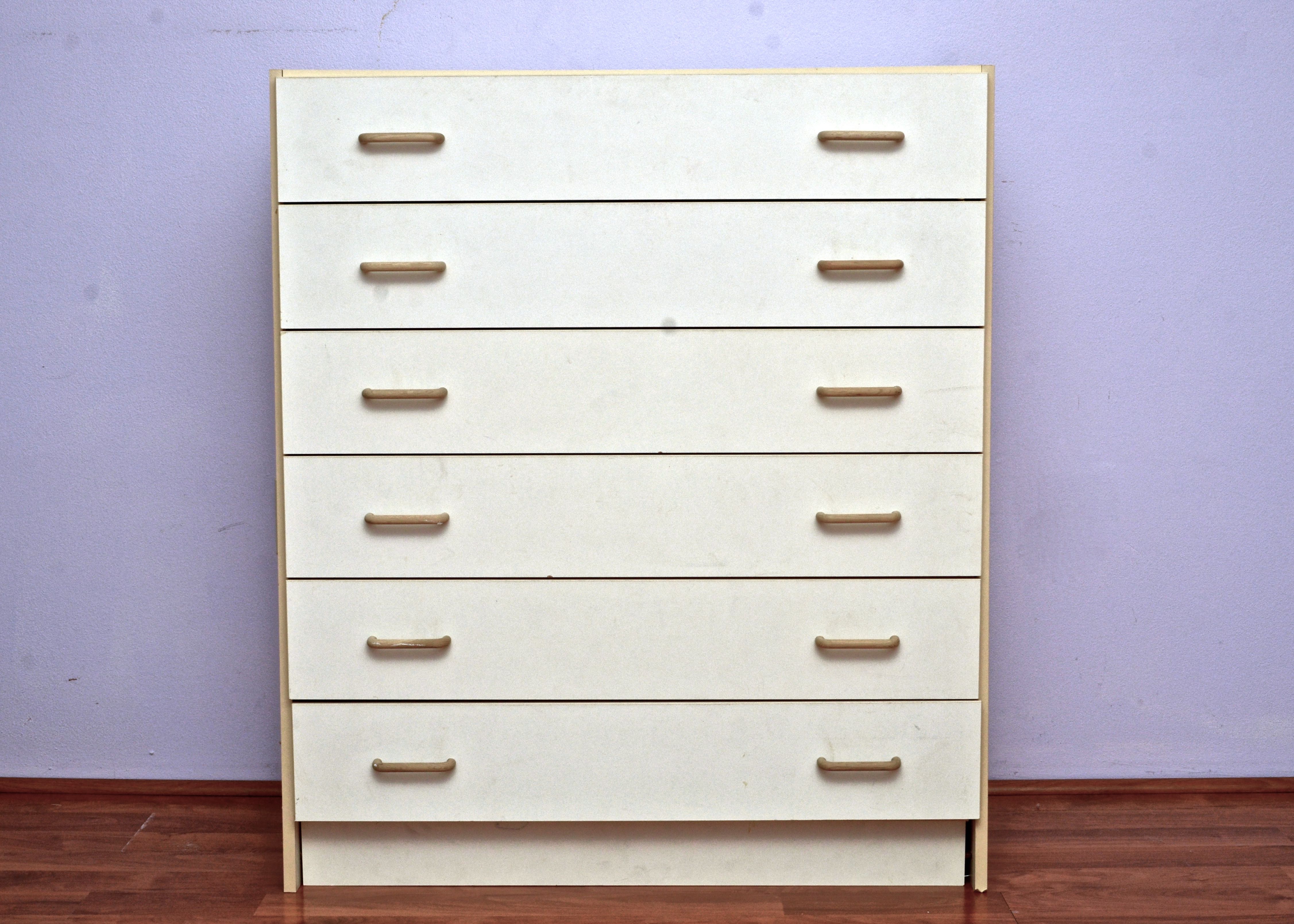 White Chest of Drawers With Six Narrow Pull Out Drawers on slides
