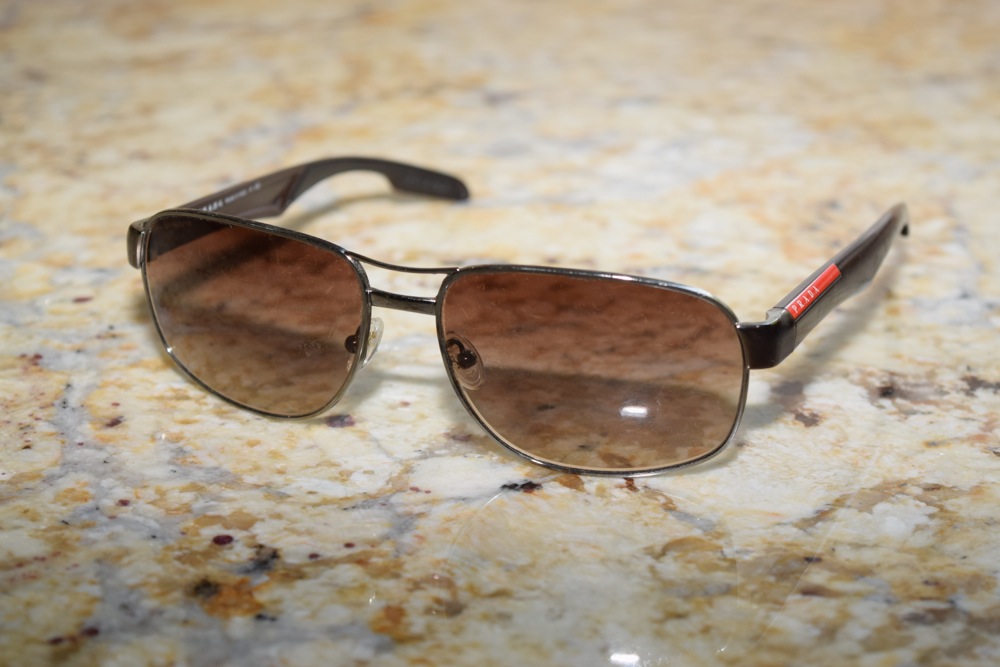 Set of Prada Sunglasses in Brown Tones