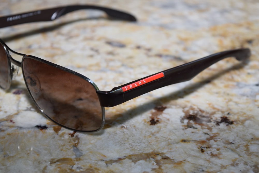 Set of Prada Sunglasses in Brown Tones