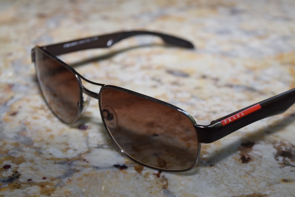 Set of Prada Sunglasses in Brown Tones