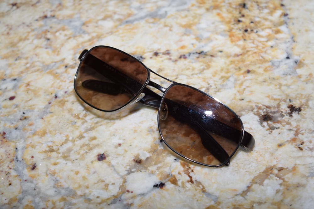 Set of Prada Sunglasses in Brown Tones