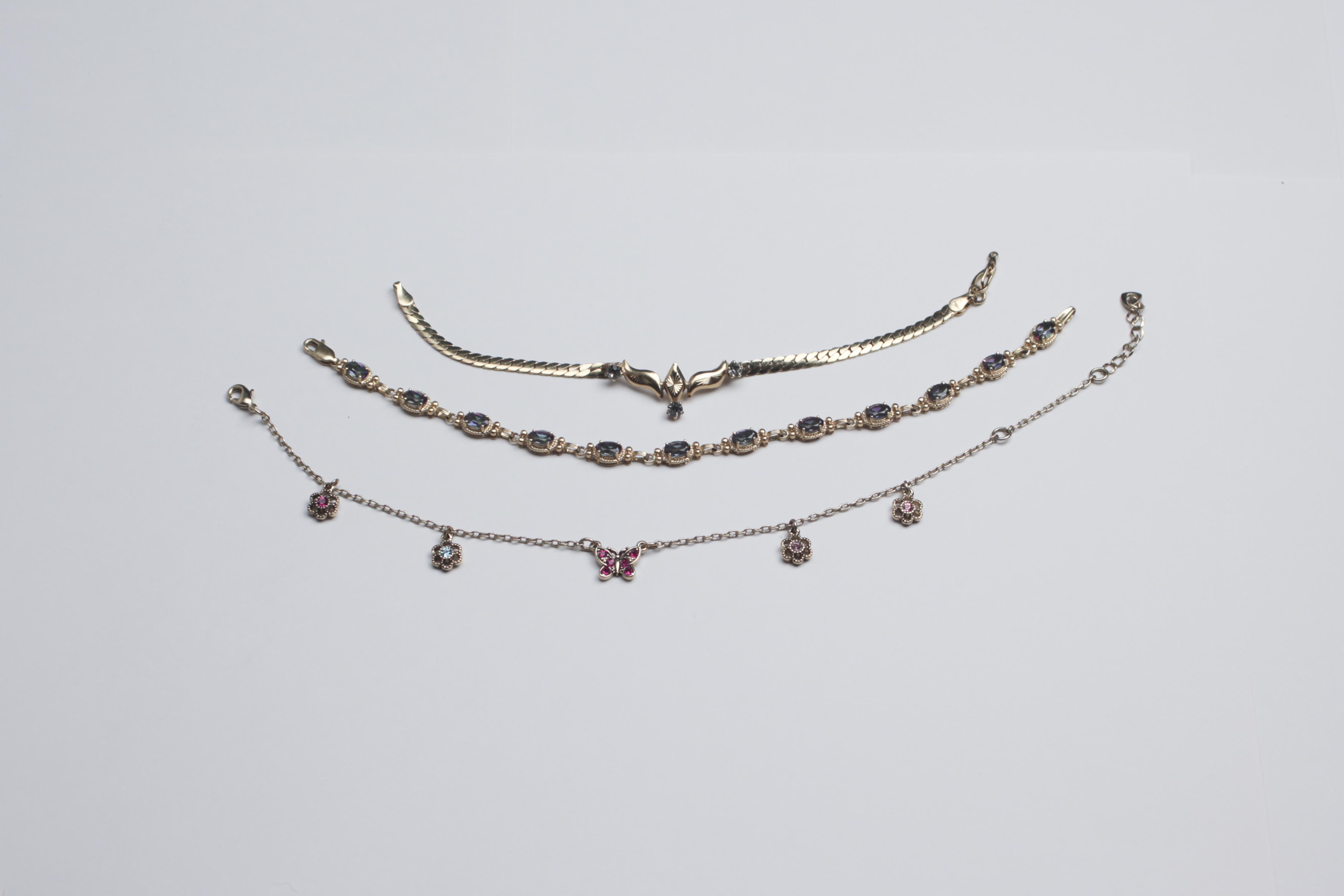 Collection of Gold Tone Bracelets