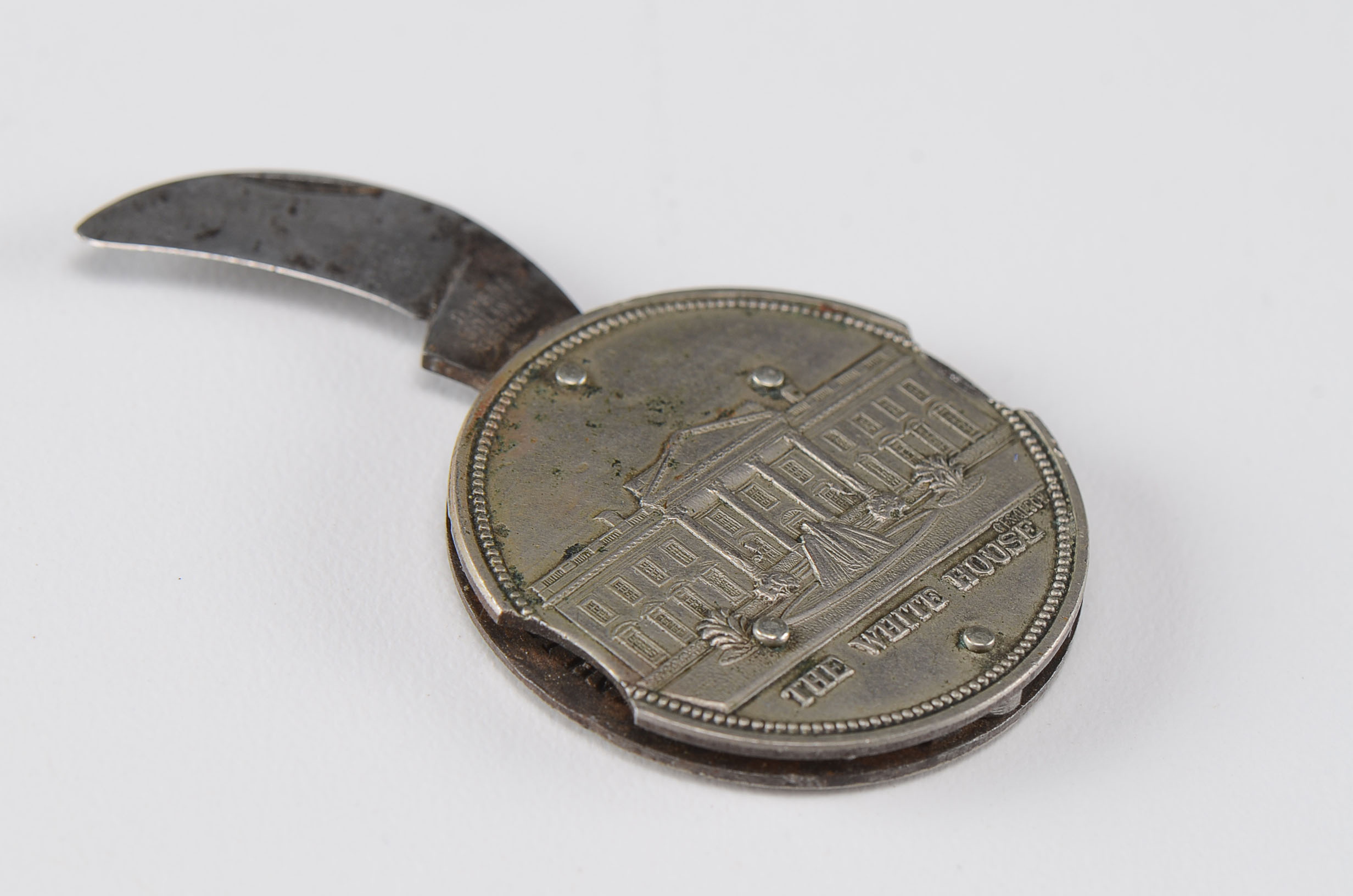 A Vintage President Wilson Coin Pocket Knife