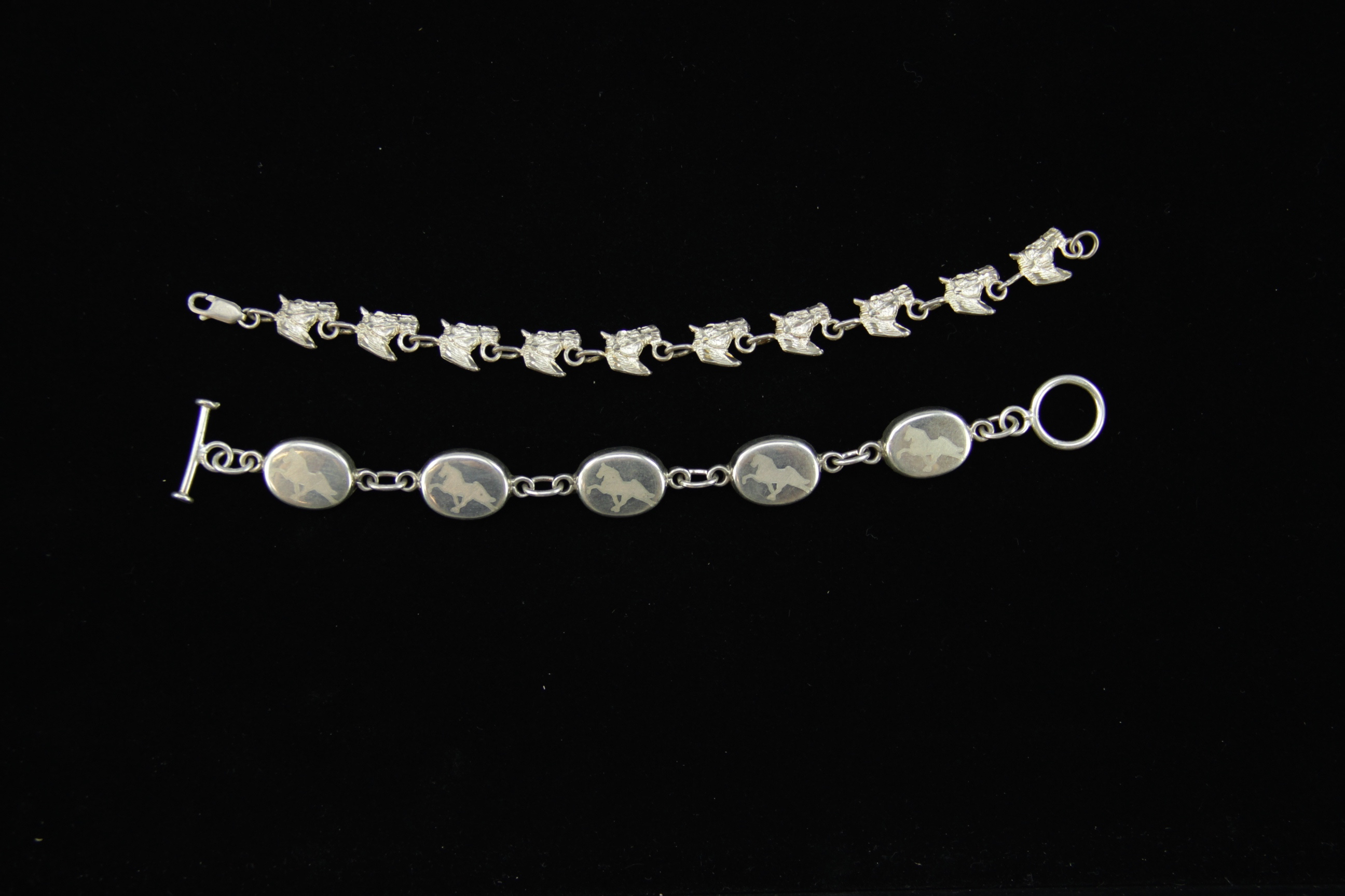 Pair of Sterling Silver Horse Bracelets