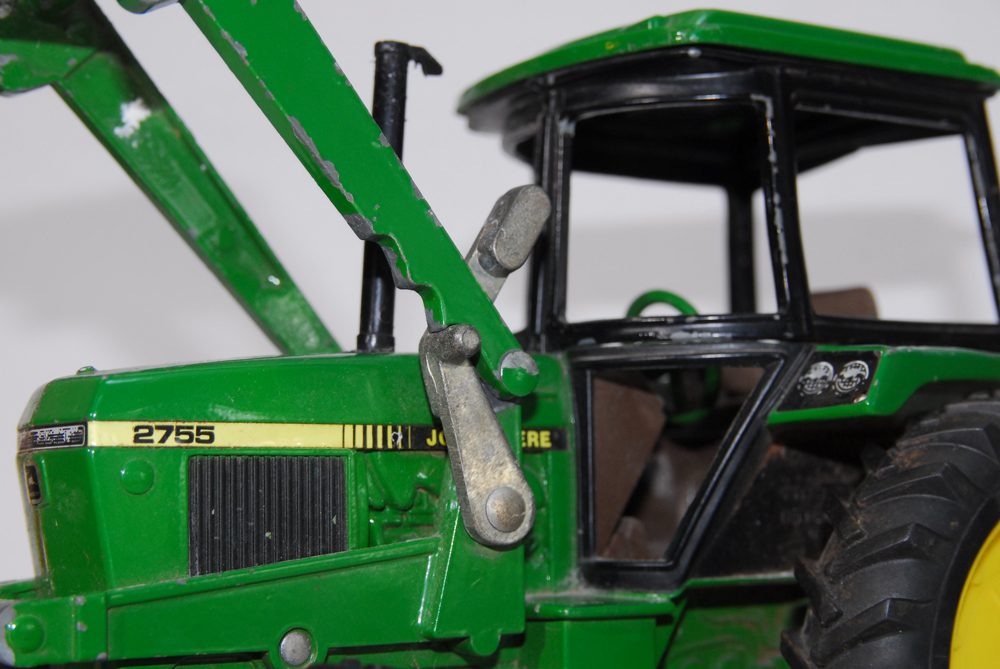 A Pair of Metal Tractor Toys