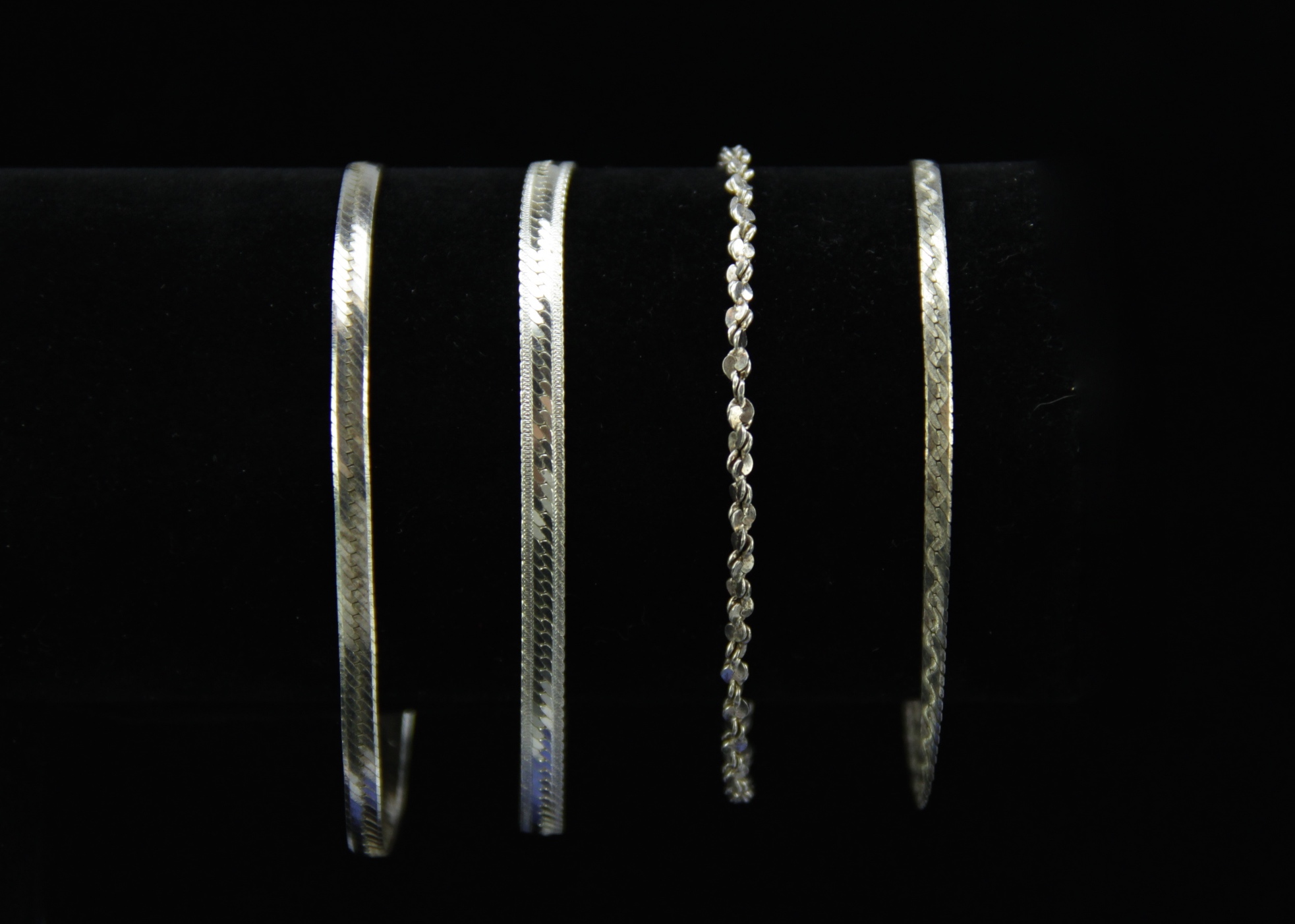 Four Sterling Silver Bracelets