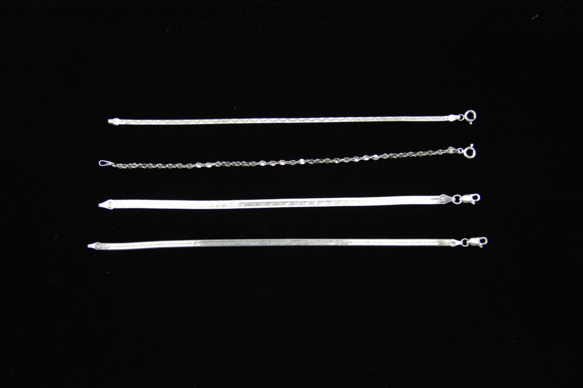 Four Sterling Silver Bracelets