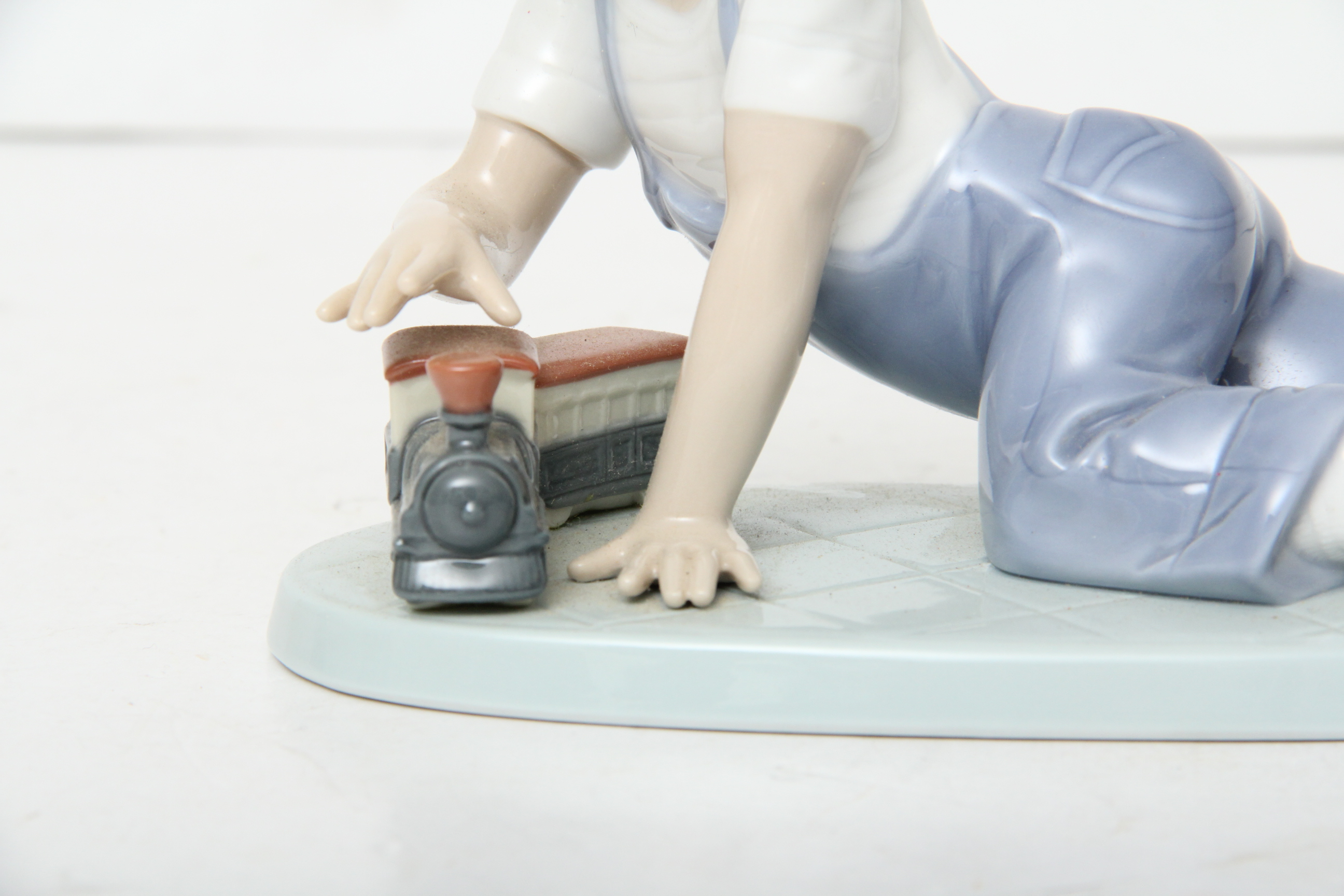 Lladro Boy Figurine