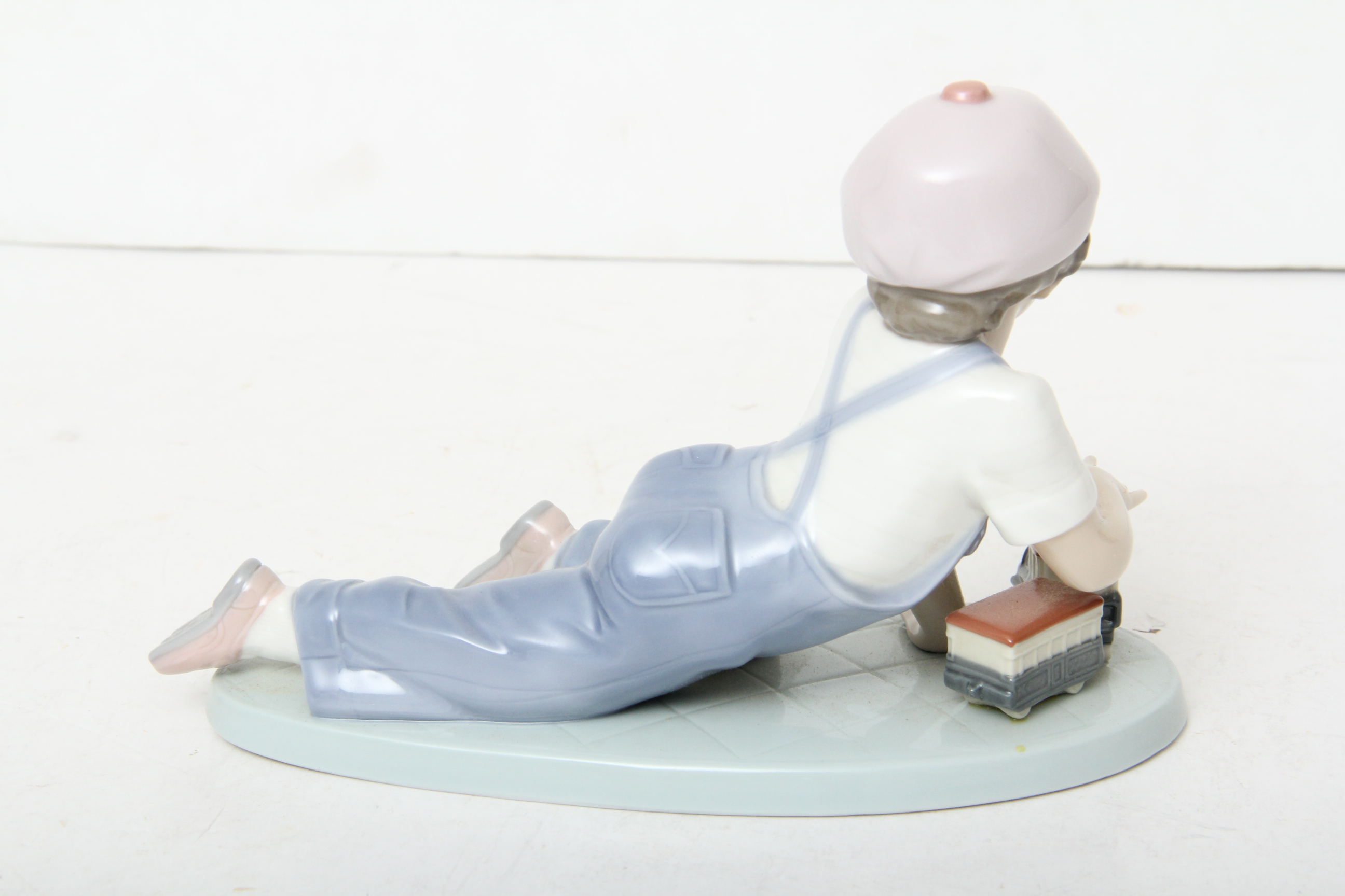 Lladro Boy Figurine