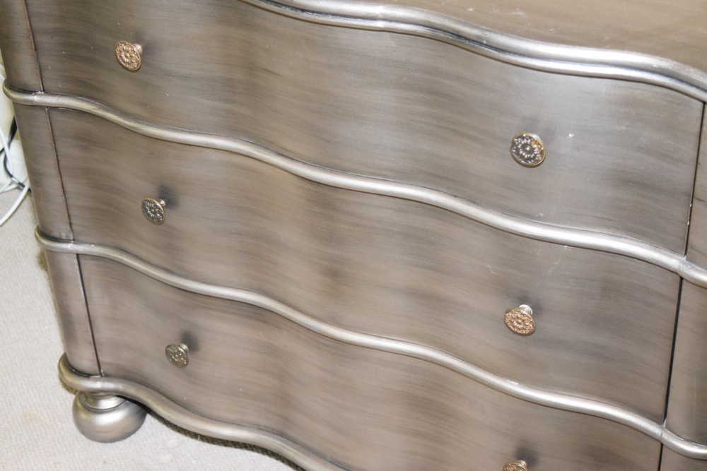 Antiqued Silver Tone Finish Serpentine Chest of Drawers