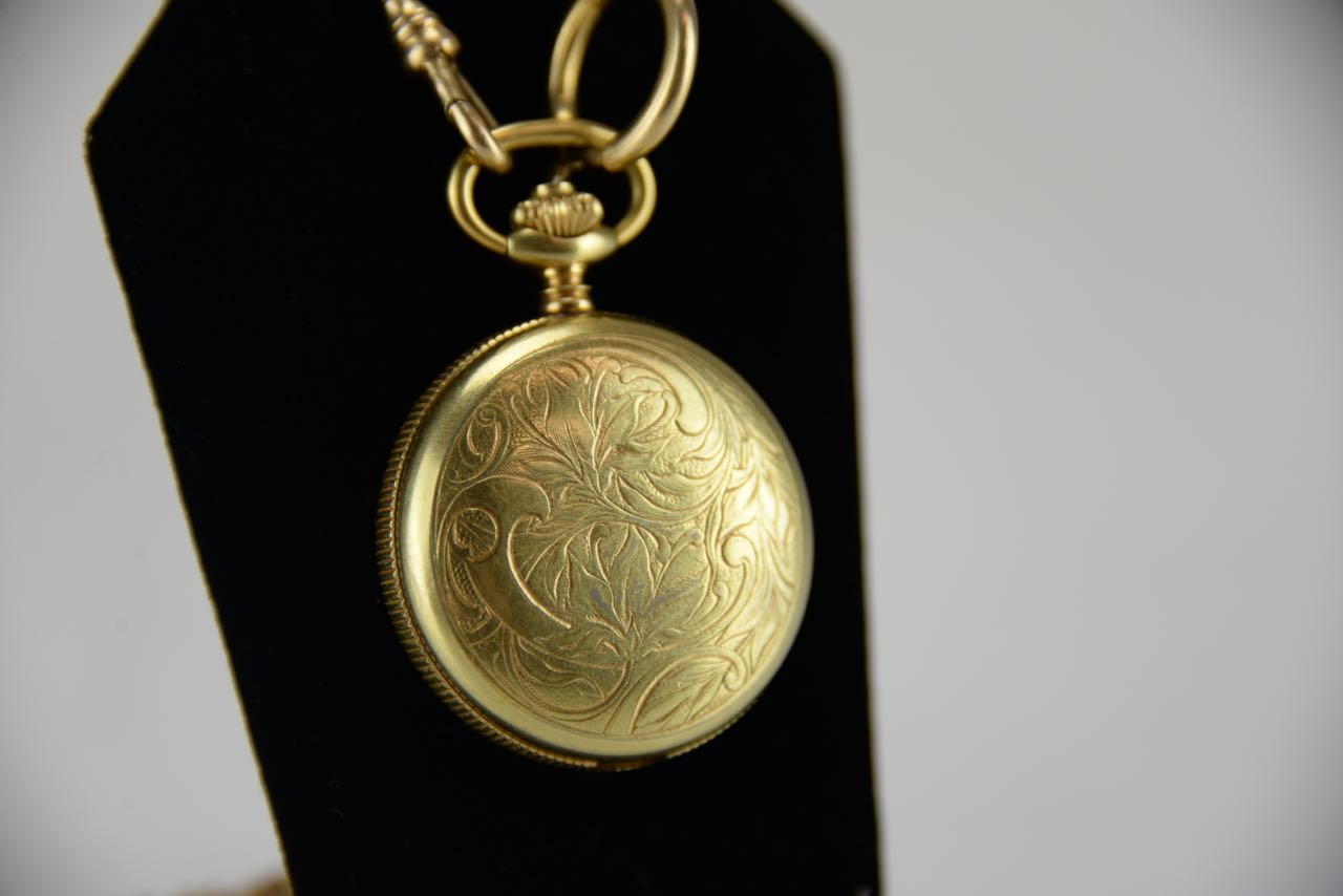 Women's Vintage Caravelle Pocket Watch and 12 Karat Gold Chain