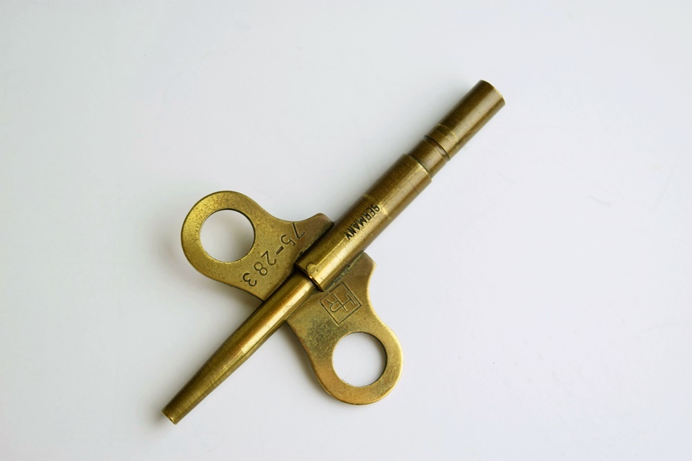 Ansonia "Fisher & Hunter" Swing Arm Clock, Circa 1890