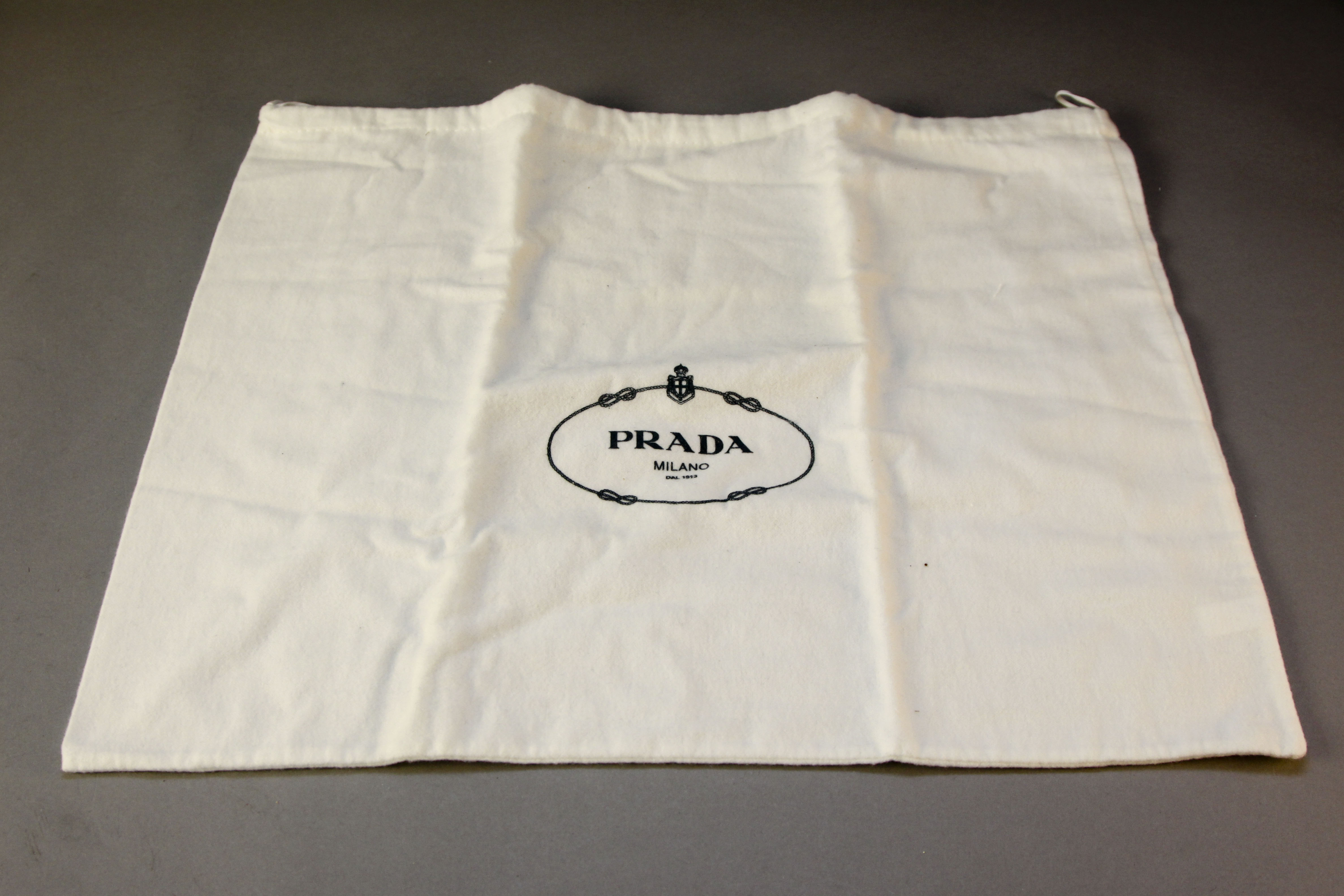 Grouping of Designer Dust Covers and Bags