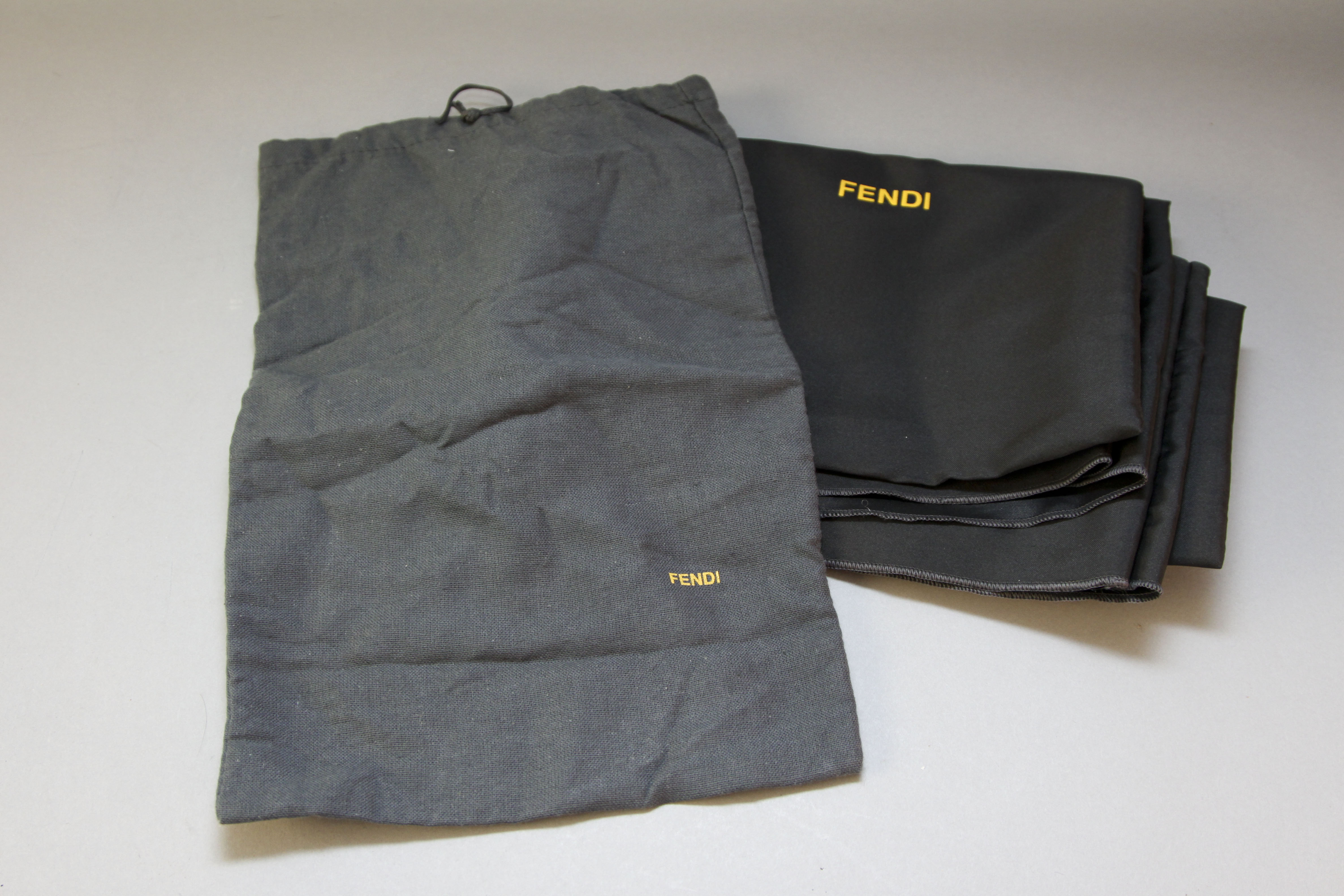 Grouping of Designer Dust Covers and Bags