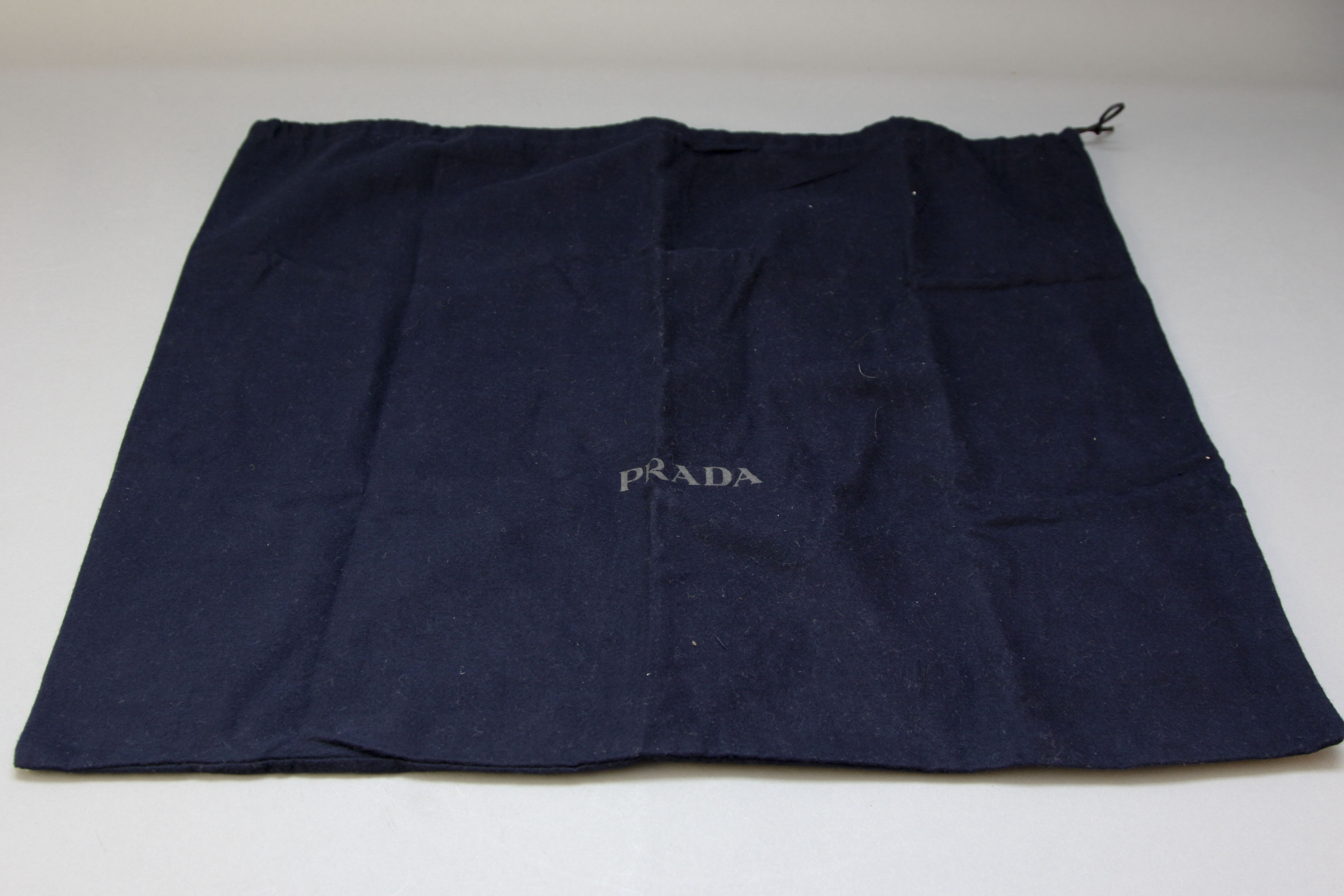 Grouping of Designer Dust Covers and Bags