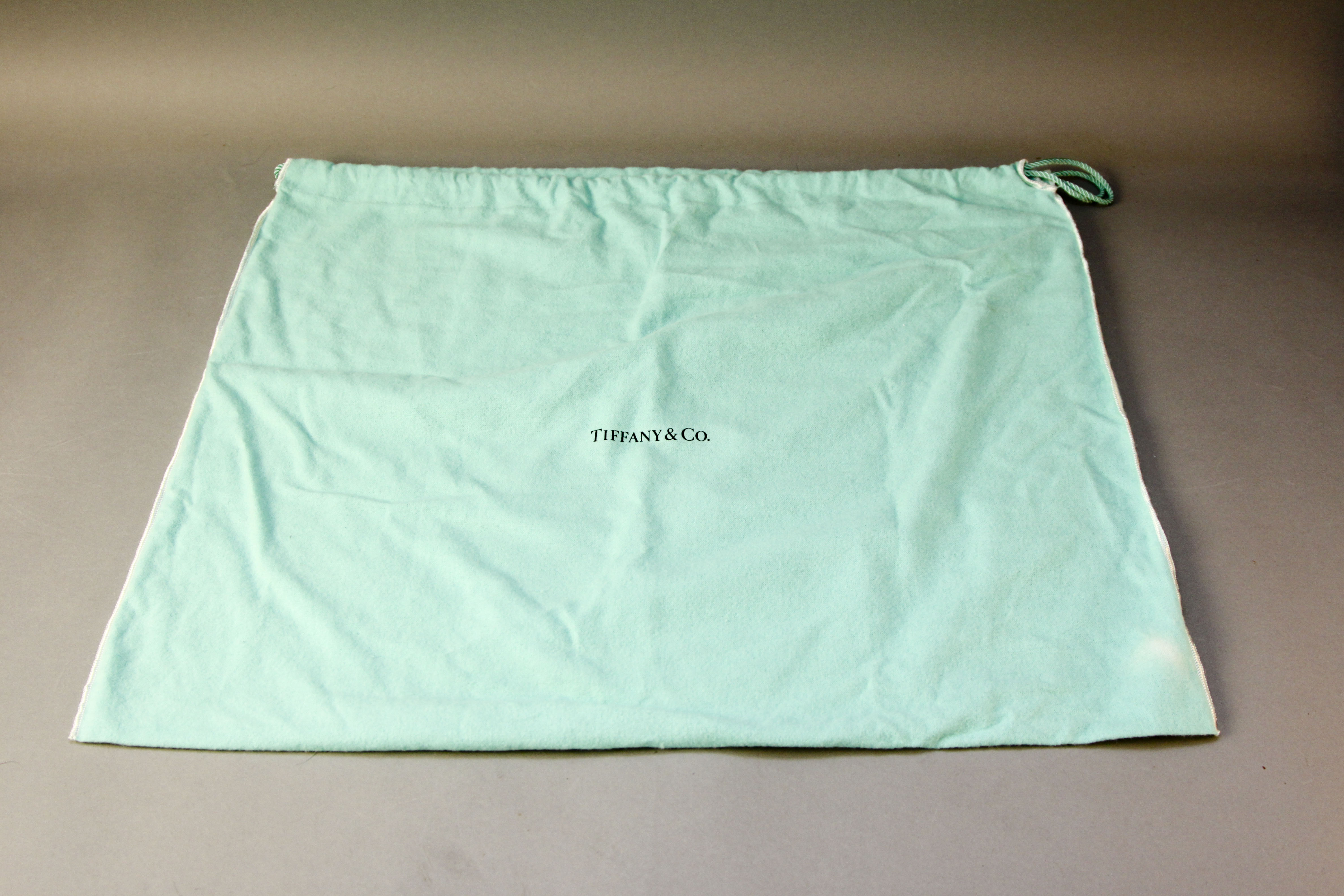 Grouping of Designer Dust Covers and Bags