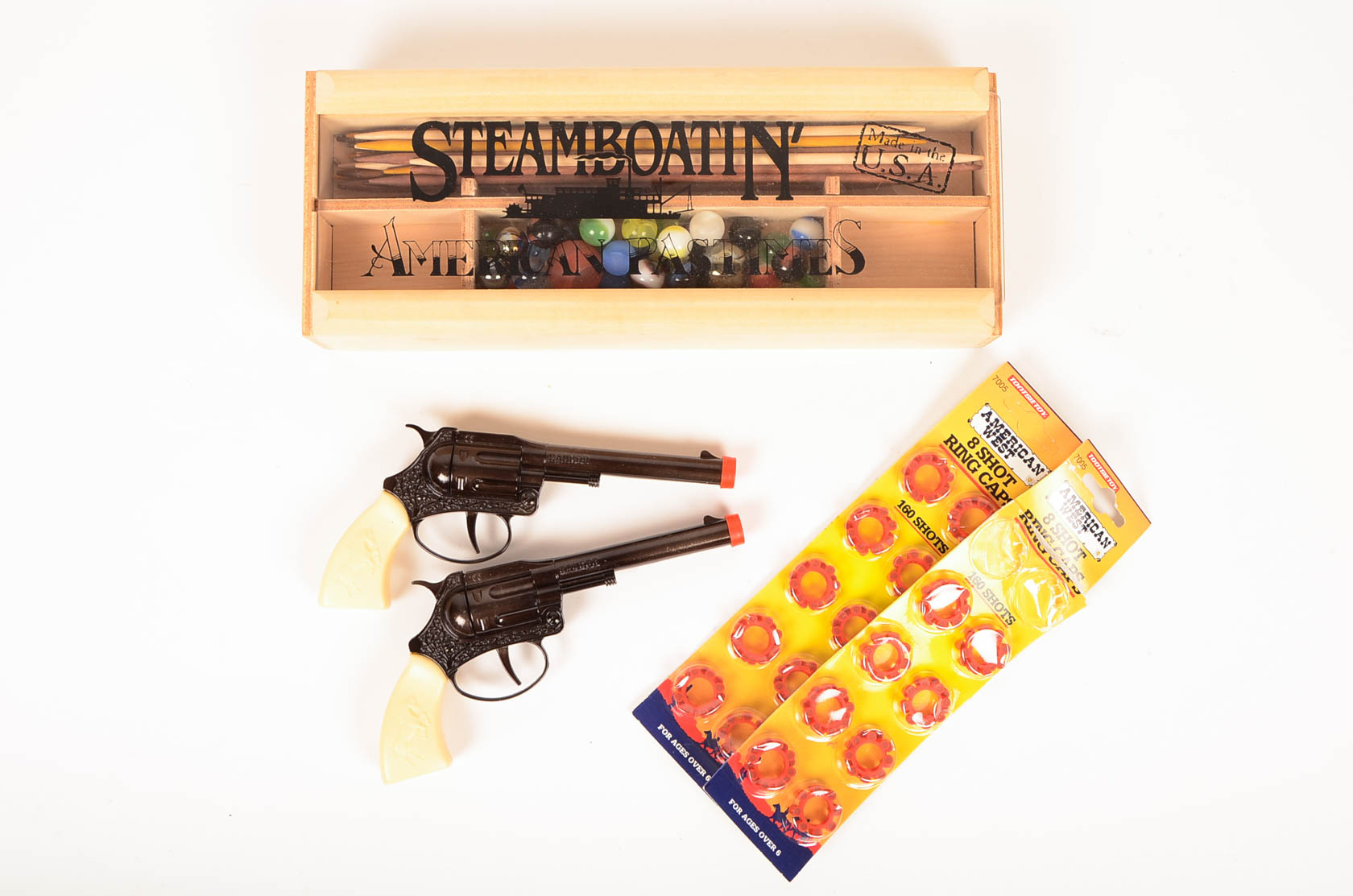 Pick Up Sticks, Marbles, and Cap Guns