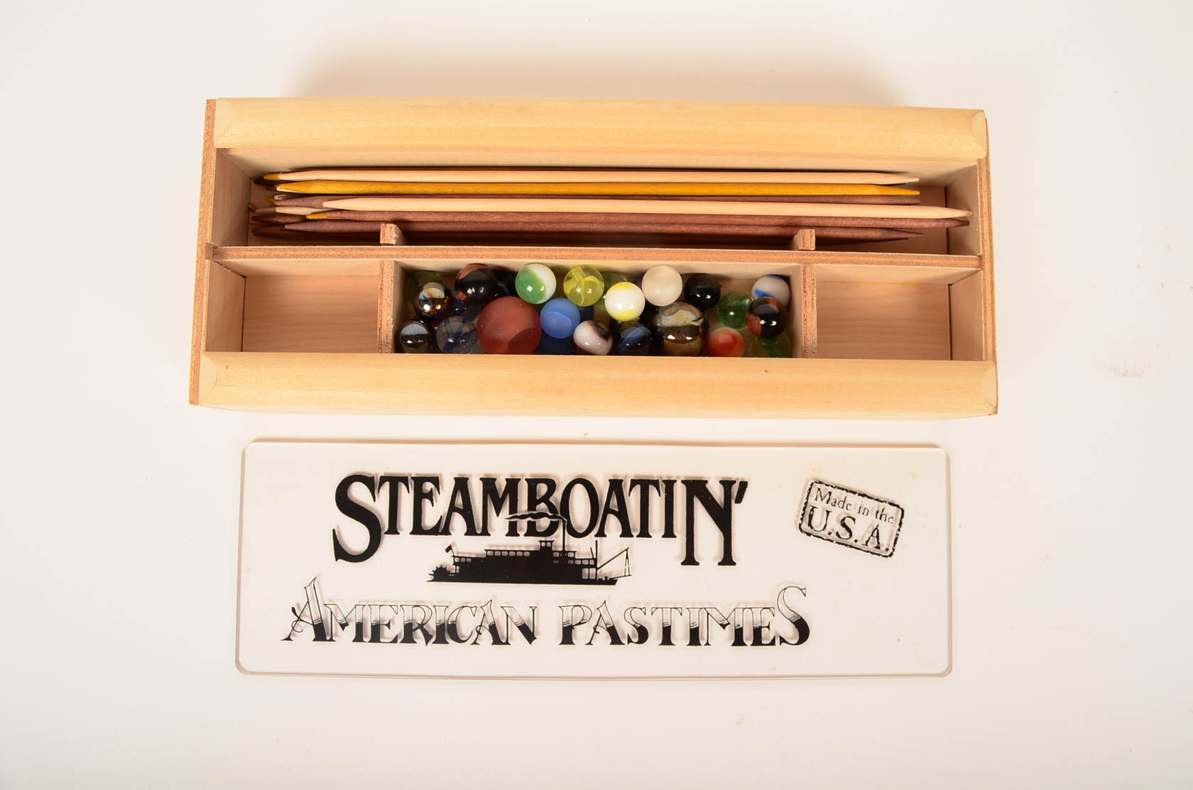 Pick Up Sticks, Marbles, and Cap Guns