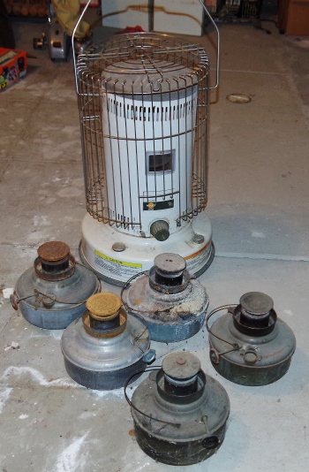 Collection of Kerosene Heaters and Lamps