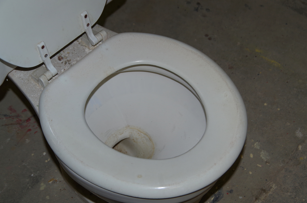 Vintage White Porcelain Toilet