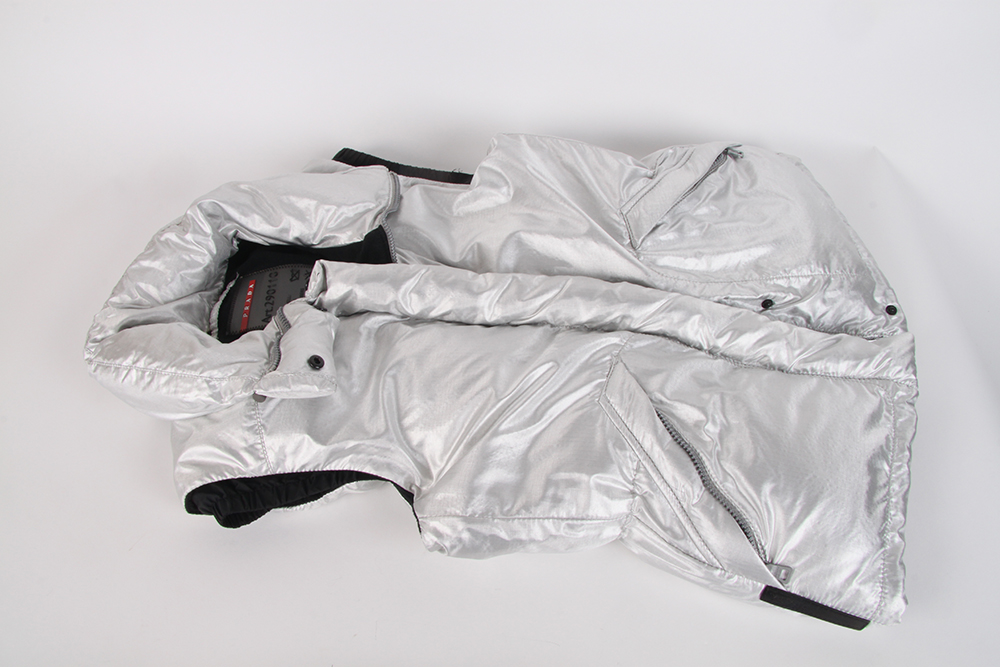 Prada Puffer Vest and Pinstripe Escada Trousers