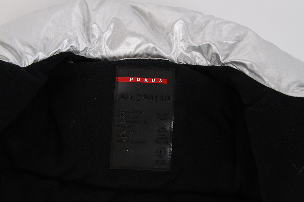 Prada Puffer Vest and Pinstripe Escada Trousers