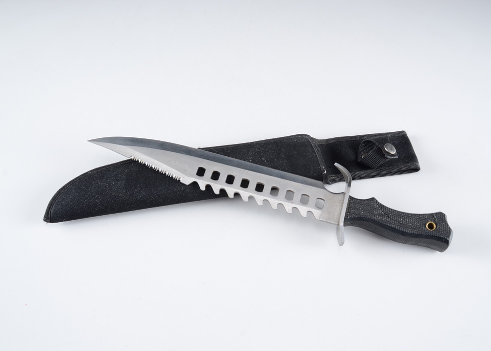 A "Rambo" style Survival Knife with Nylon Sheath