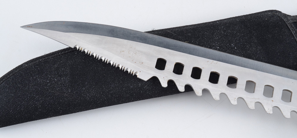 A "Rambo" style Survival Knife with Nylon Sheath