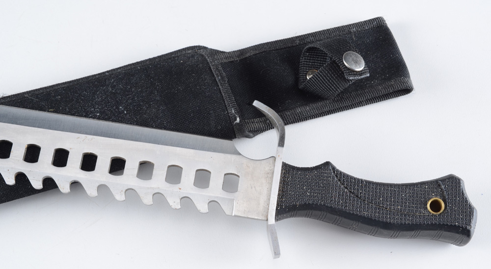 A "Rambo" style Survival Knife with Nylon Sheath