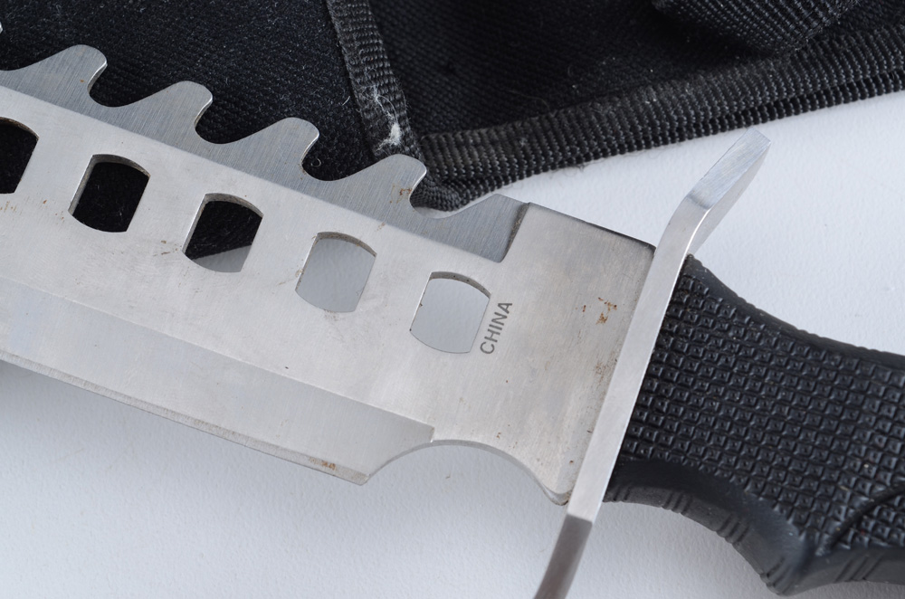 A "Rambo" style Survival Knife with Nylon Sheath