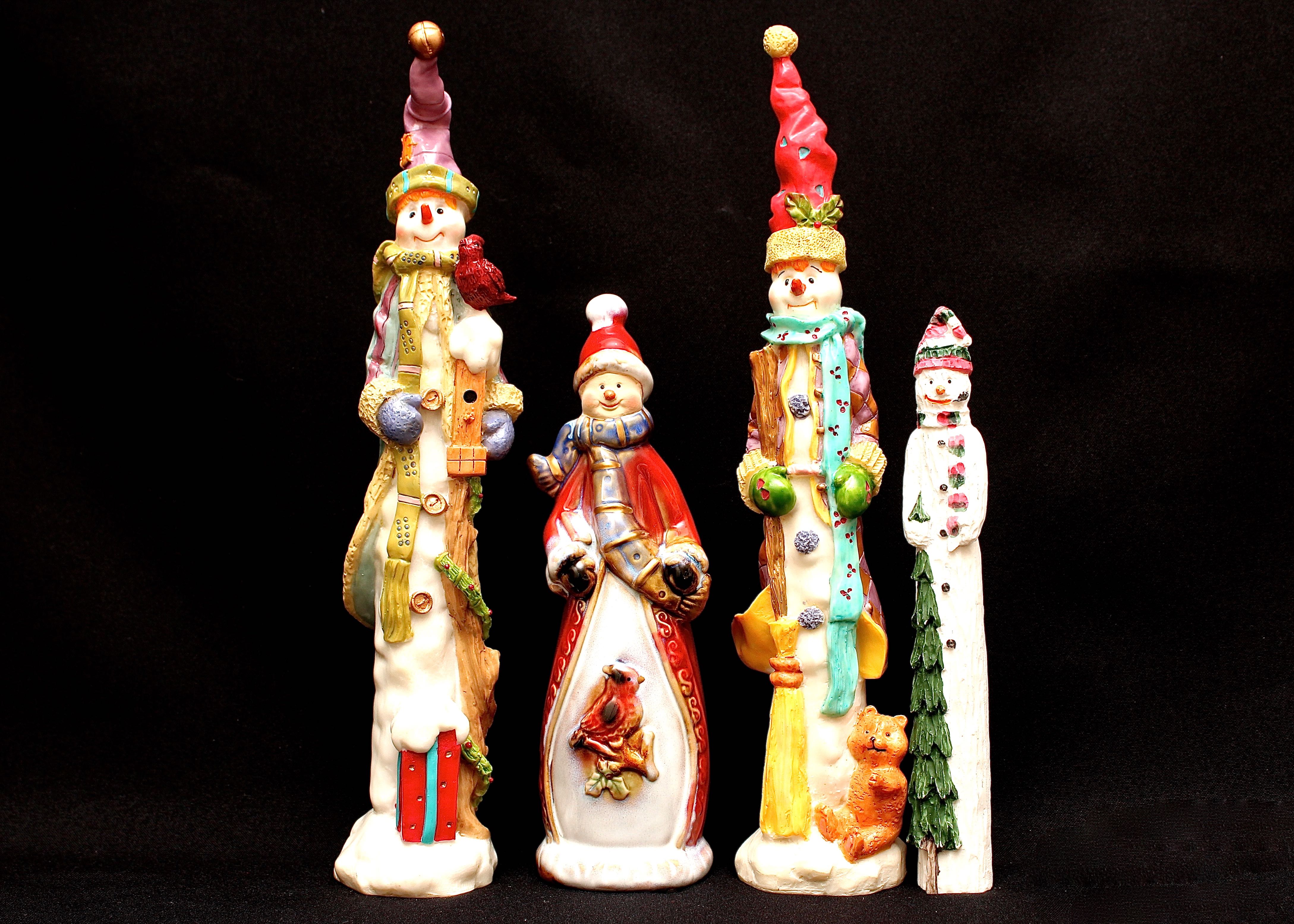 Four Snowman Figurines