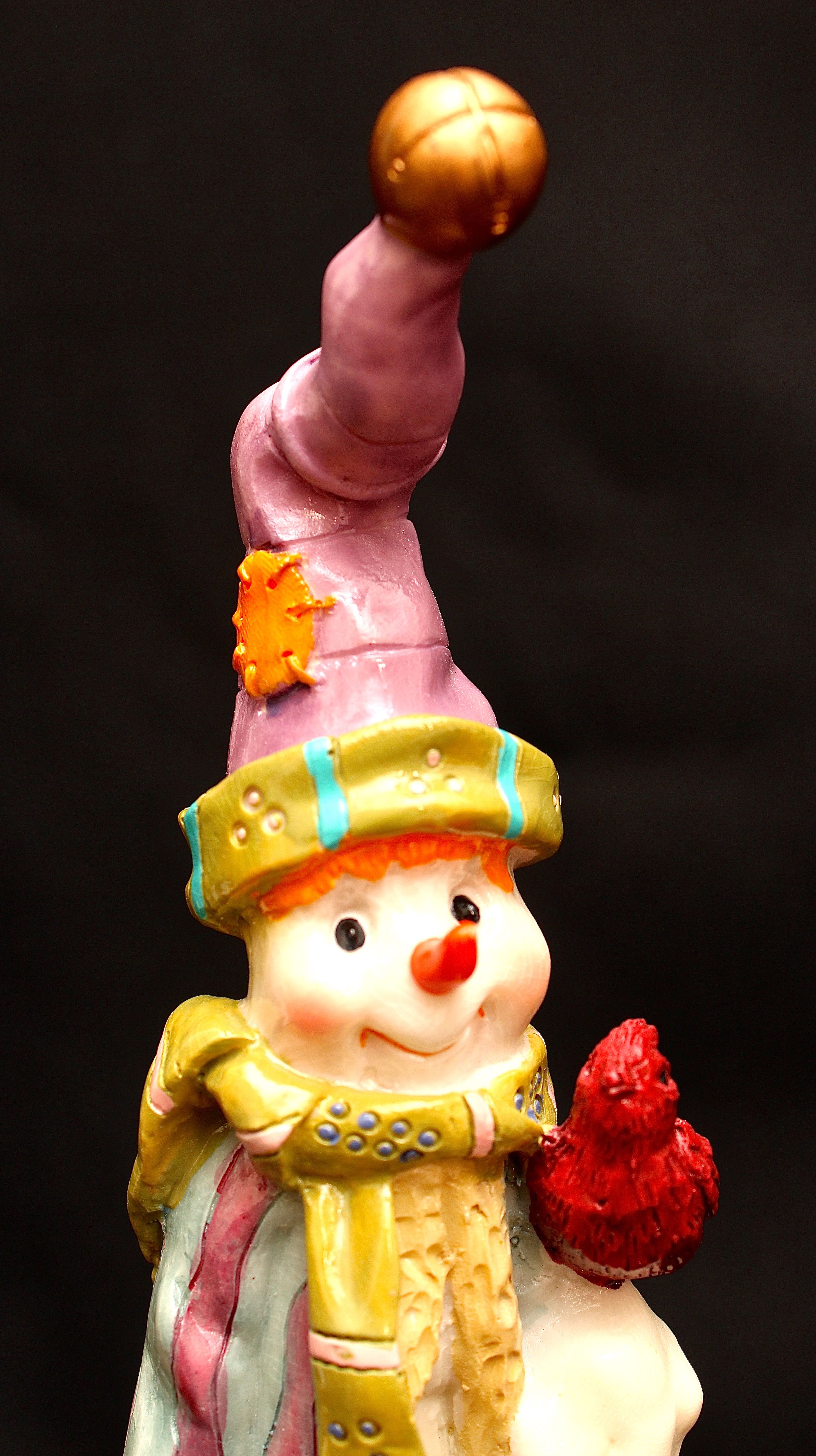 Four Snowman Figurines