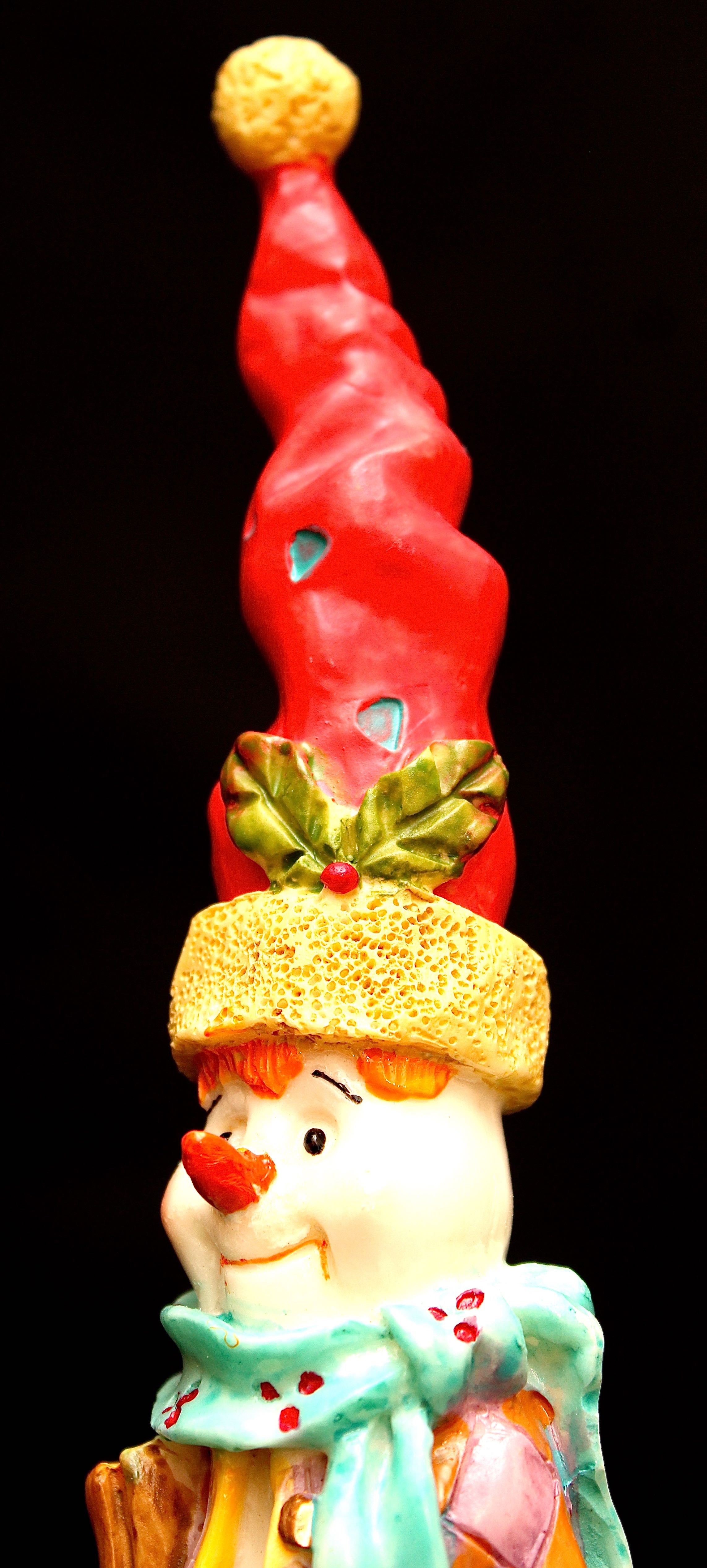 Four Snowman Figurines