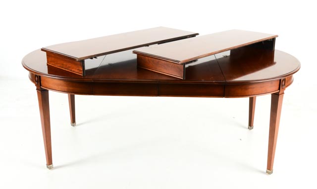 Harden Round Wood Dining Table and Four Leaves