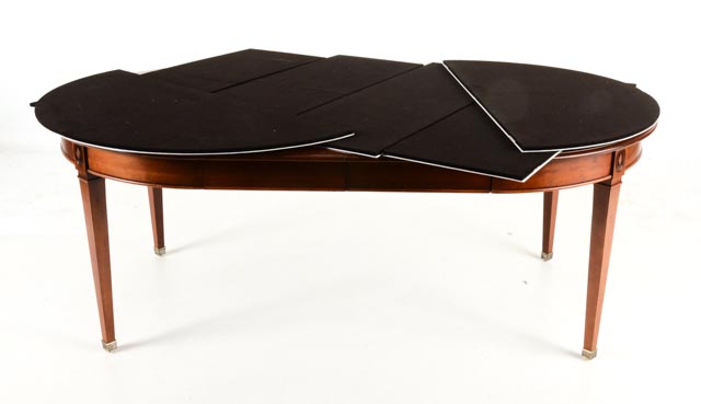 Harden Round Wood Dining Table and Four Leaves