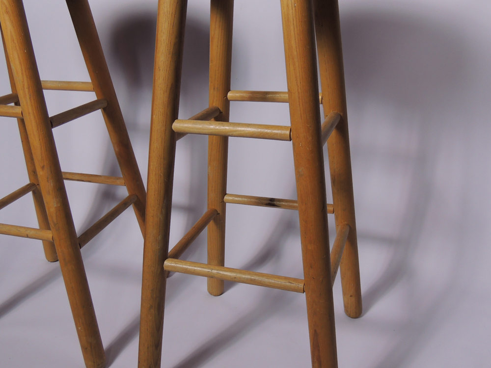 Two Wooden Stools with Padded Seats