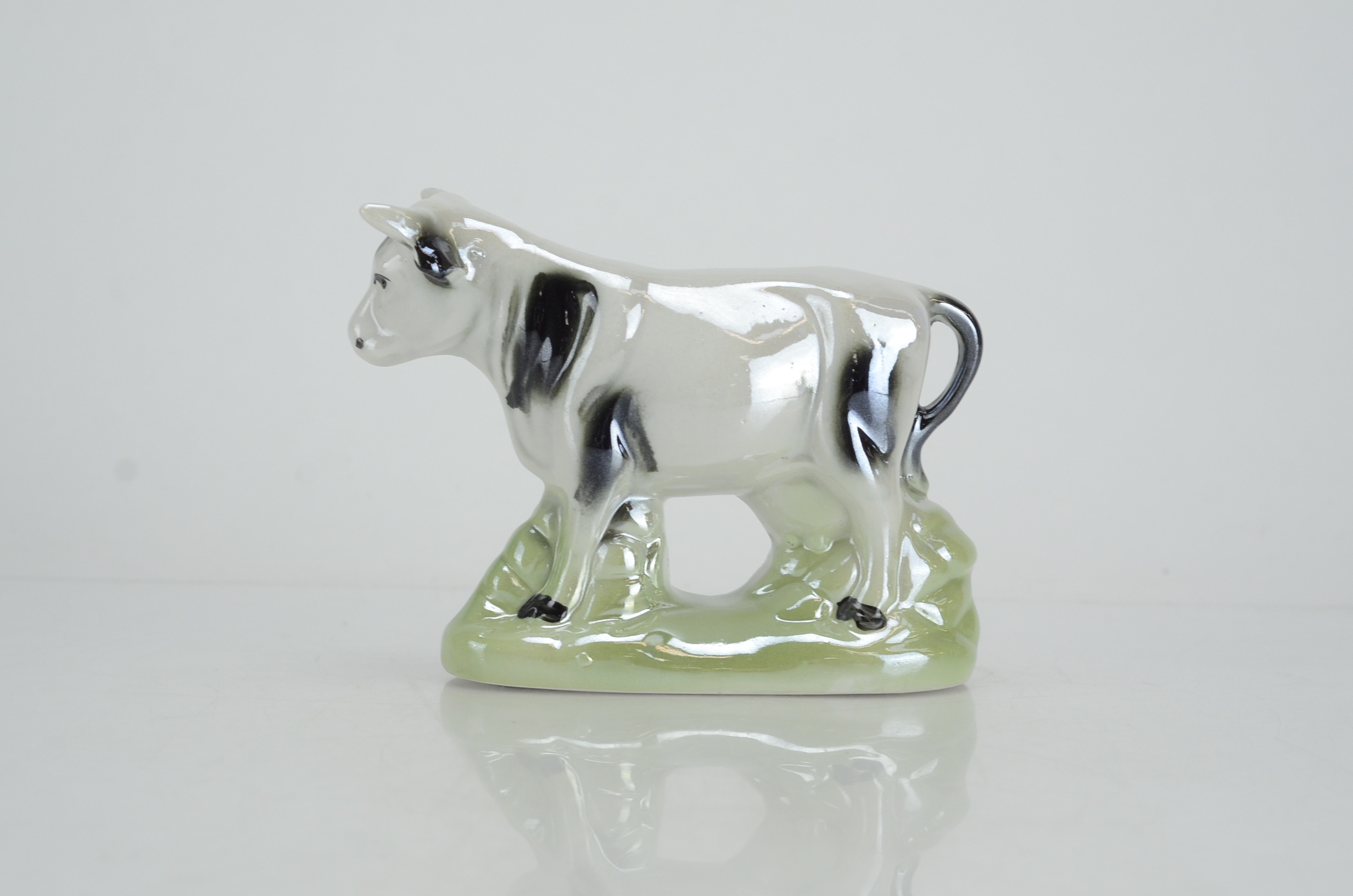 Collection of Four Vintage Cow Figurines