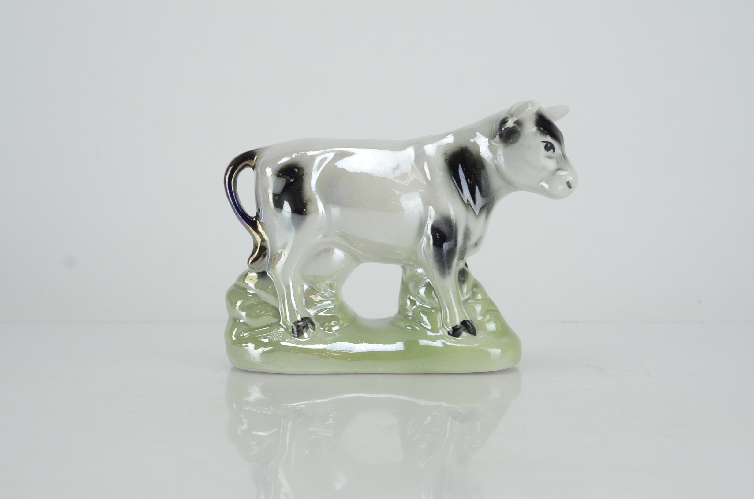 Collection of Four Vintage Cow Figurines