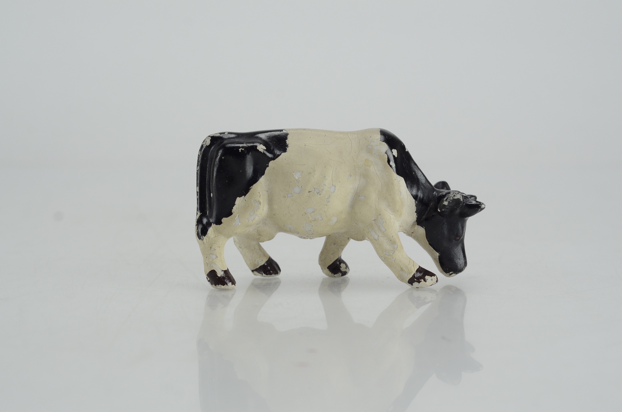 Collection of Four Vintage Cow Figurines